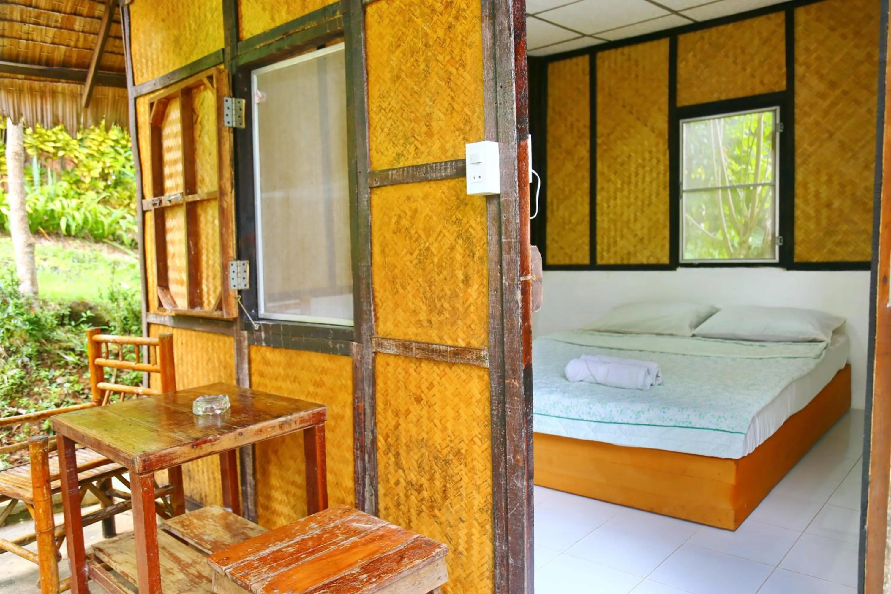 Bed in TP Hut Bungalows