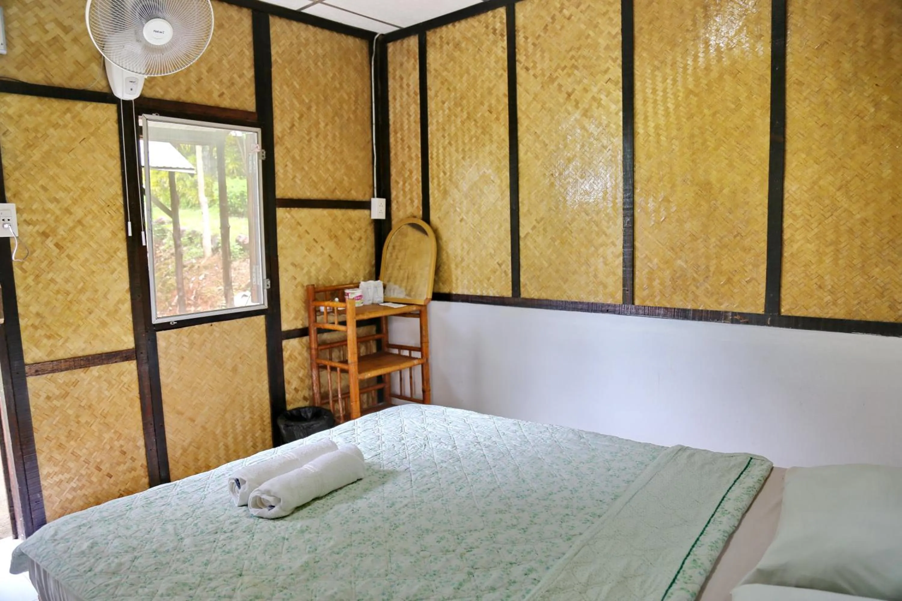 Bed in TP Hut Bungalows