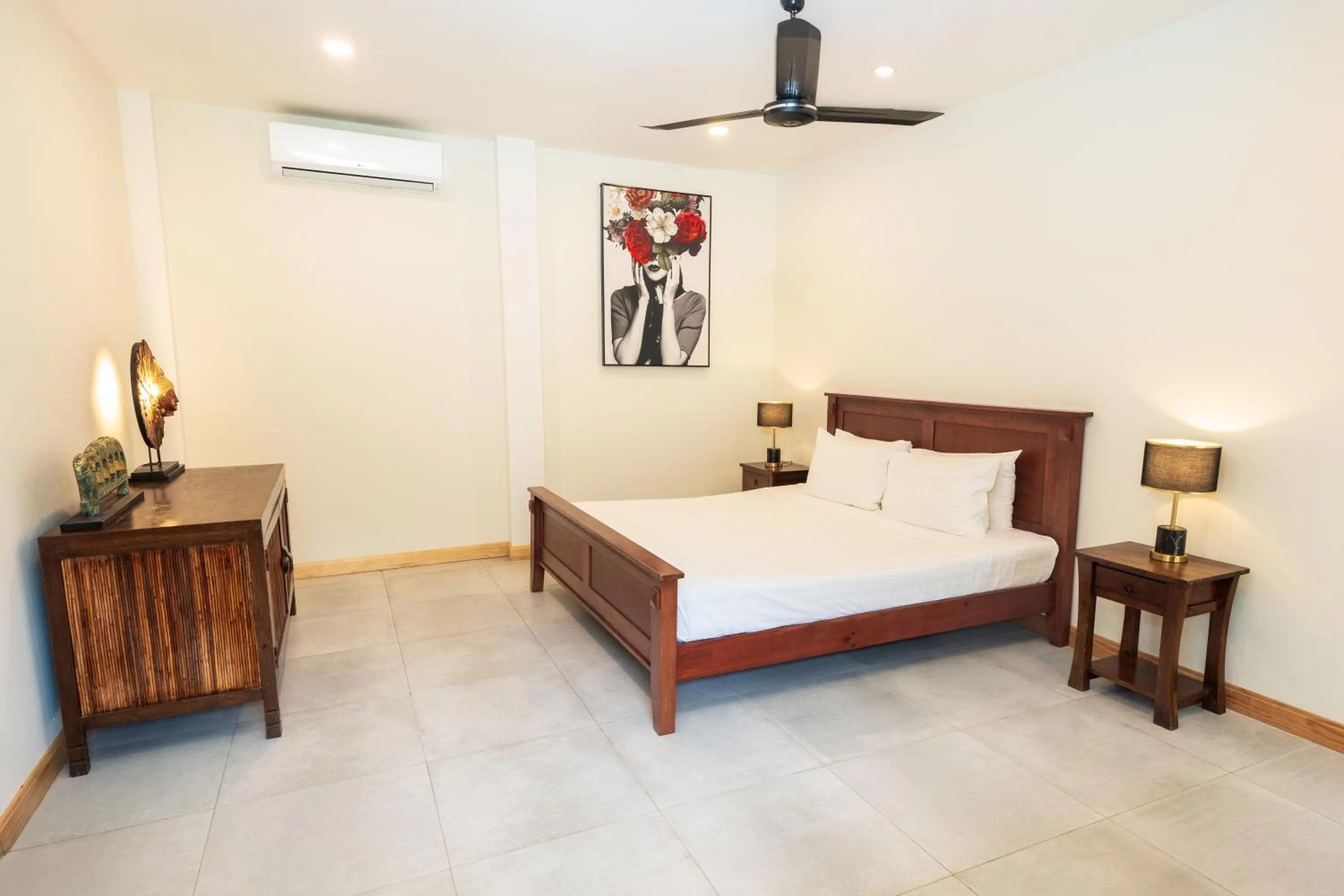 Bed in Idyllic Samui Beach Villa Resort