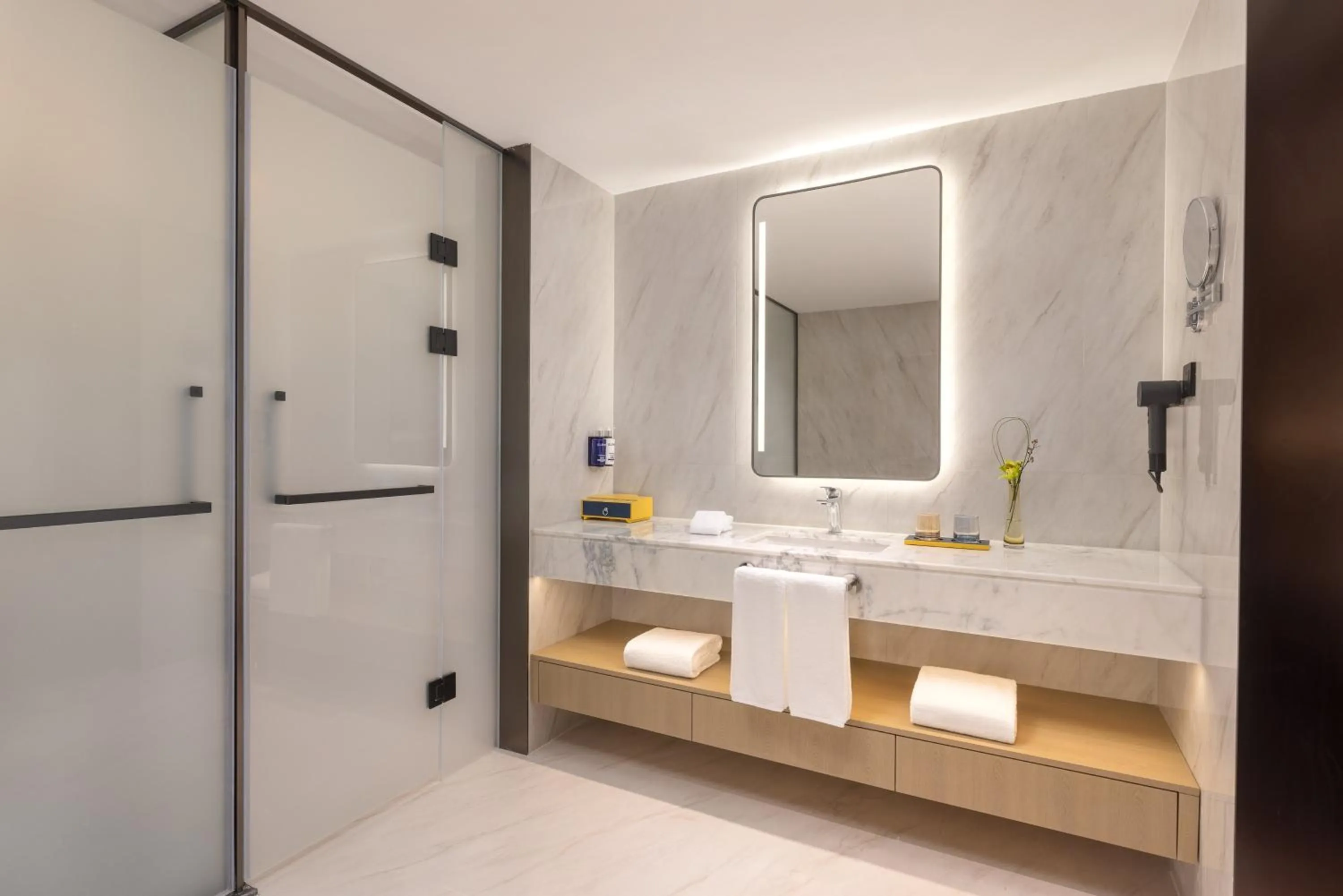 Bathroom in voco Suzhou Guanqian Street by IHG