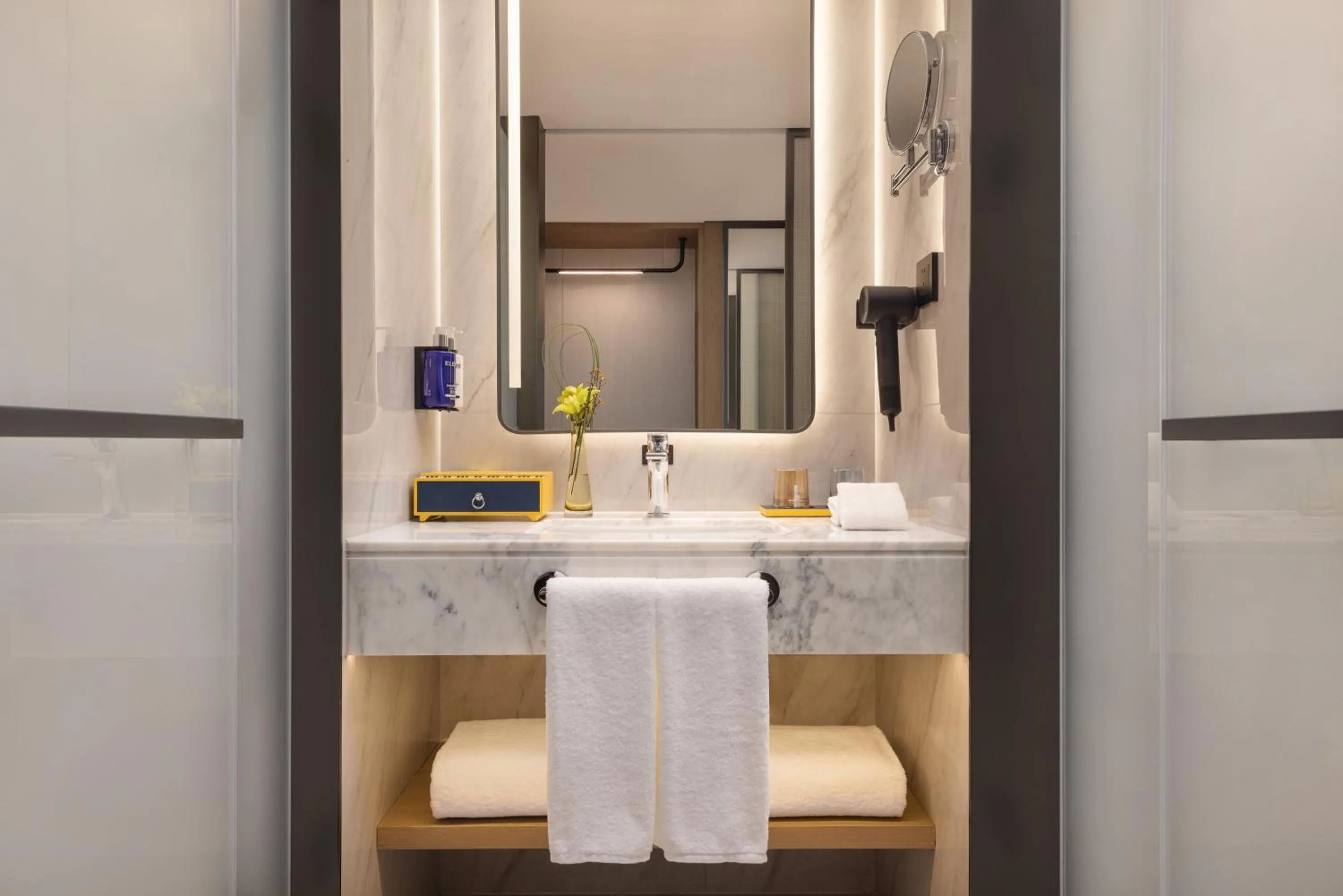 Bathroom in voco Suzhou Guanqian Street by IHG