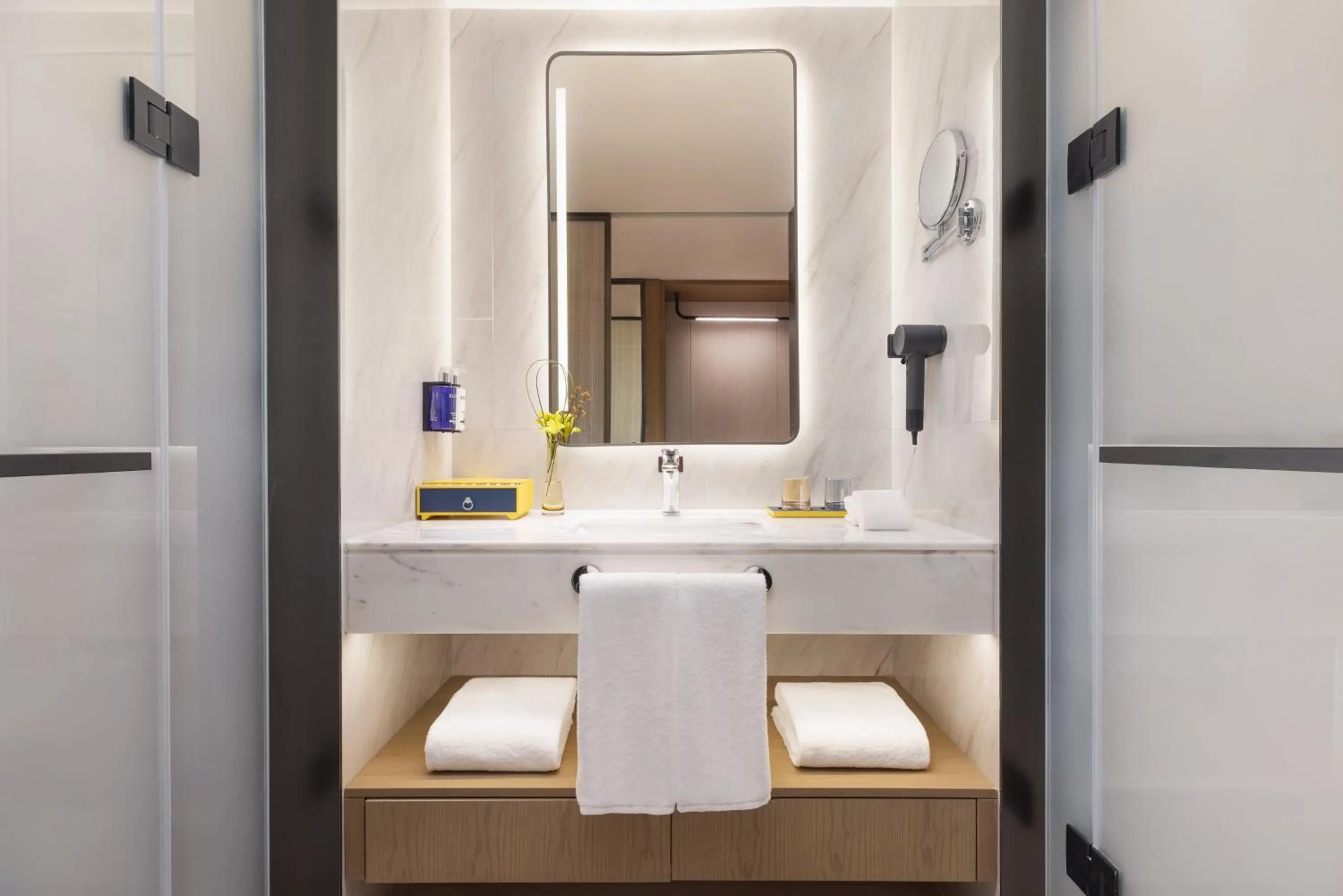 Bathroom in voco Suzhou Guanqian Street by IHG