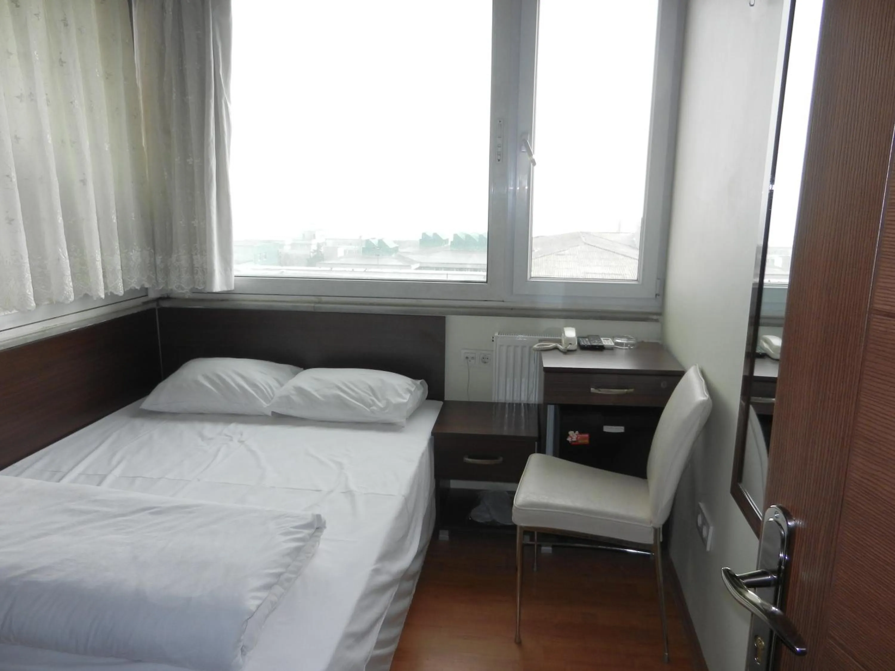 Photo of the whole room, Bed in Cagri Hotel