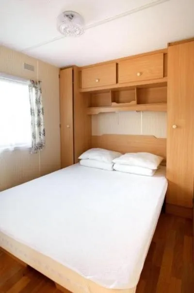 Bedroom in Domki Holenderskie Eden Resort & Spa