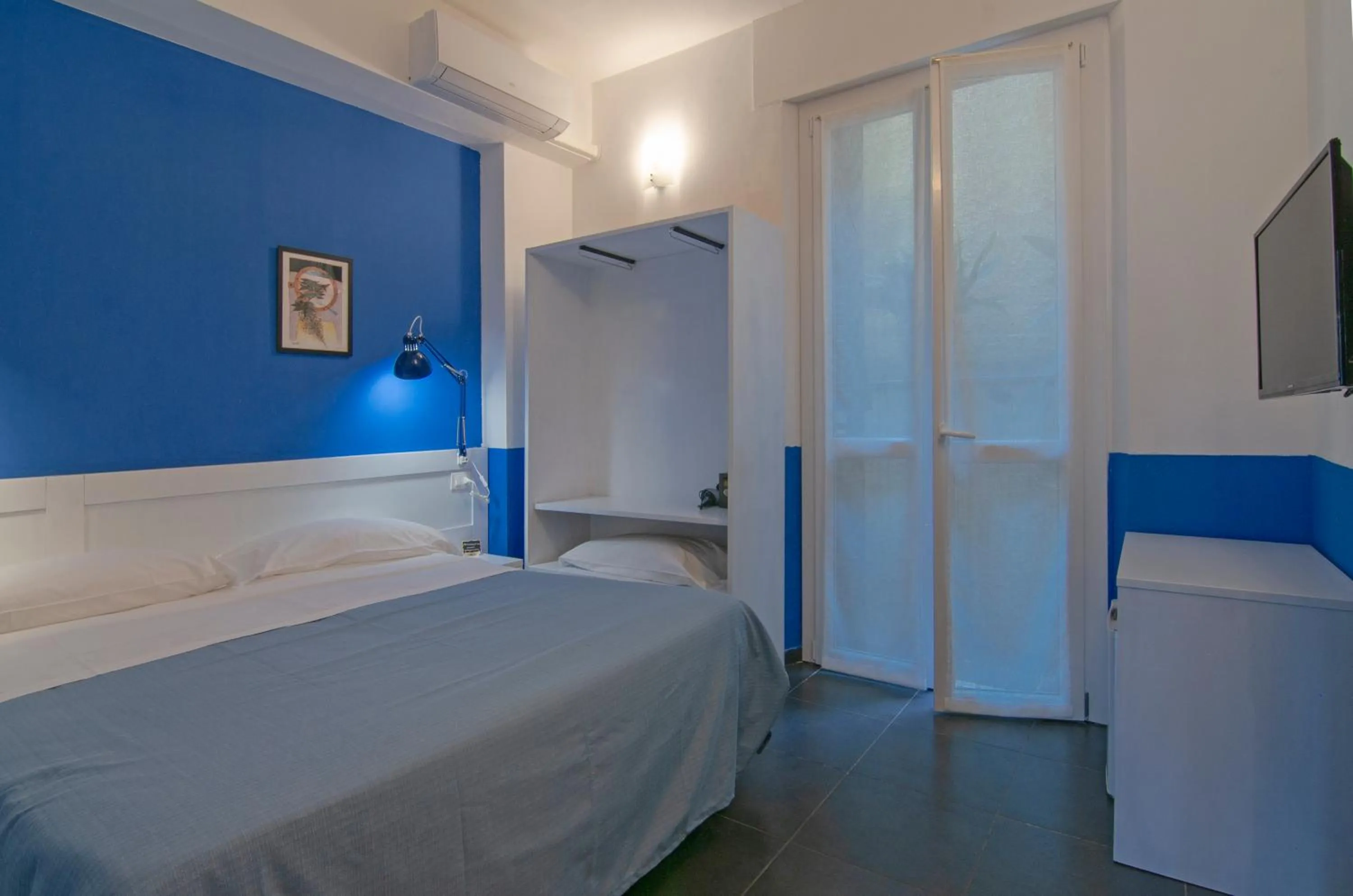 Bed in Hotel Villa Argentina