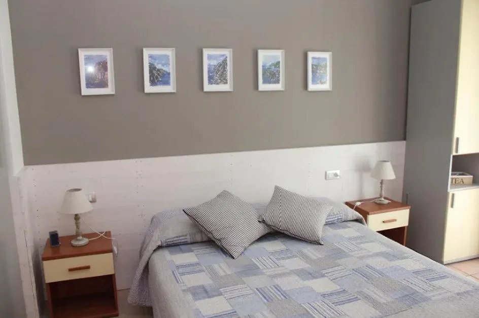 Bed in Hotel Villa Argentina