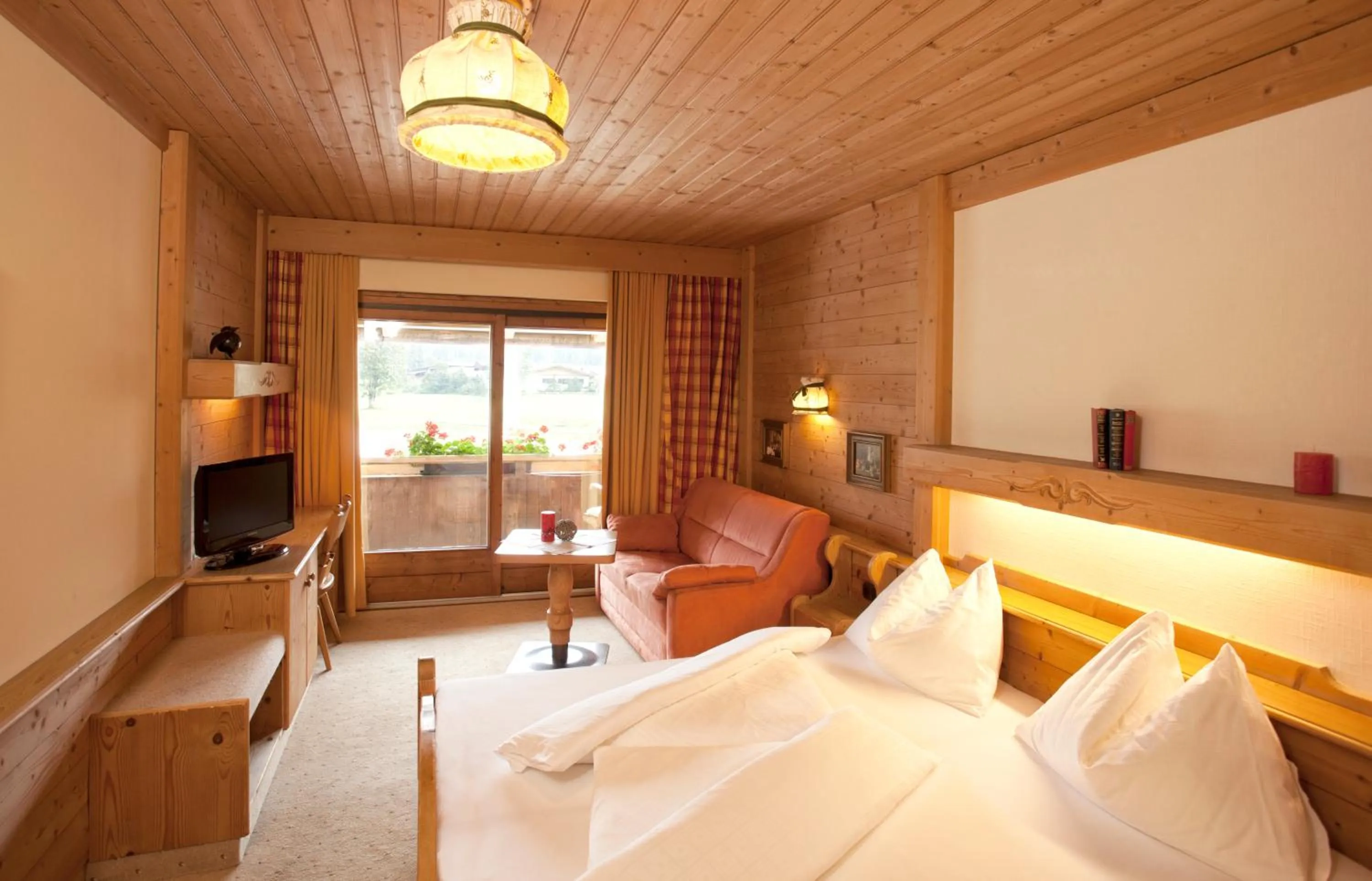 Photo of the whole room, Bed in Landhotel Strasserwirt