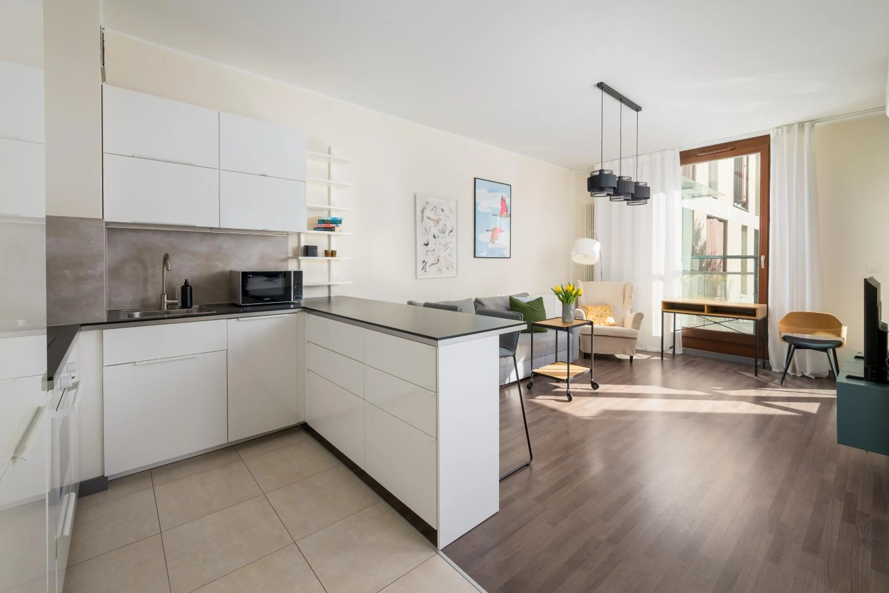 Kitchen or kitchenette in ApartHotel Kolejowa Apartamenty