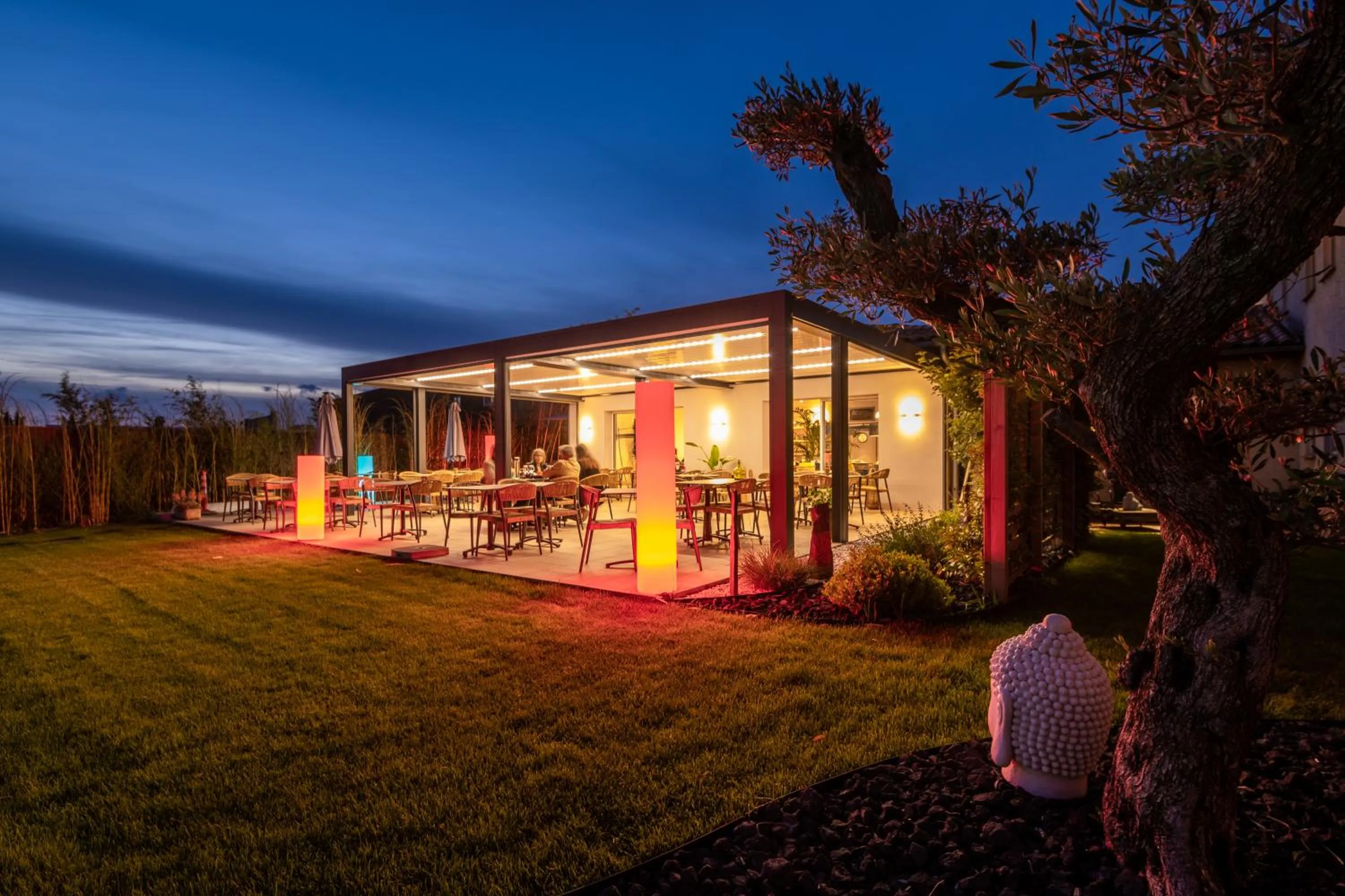 Patio in LOGIS Hôtel Restaurant Le Clos Fleuri