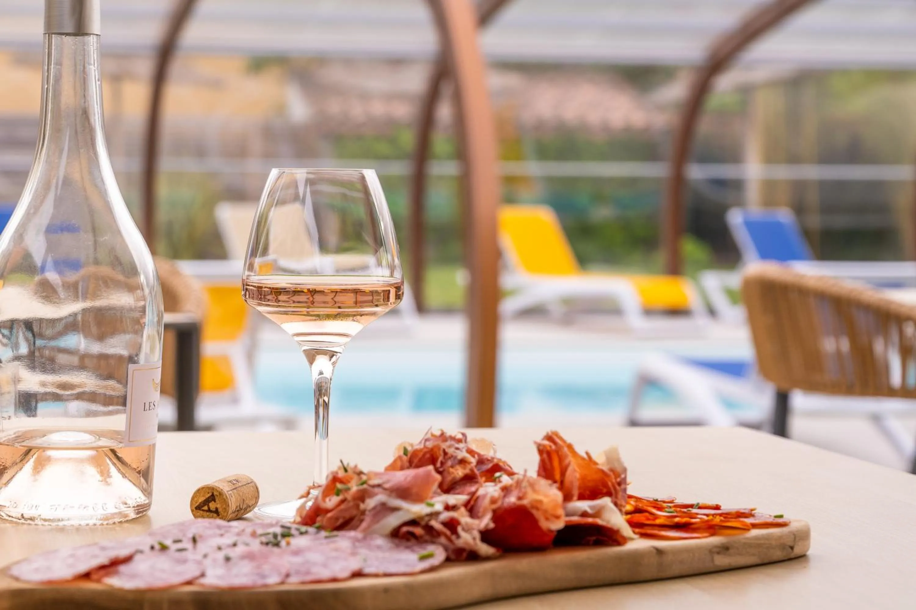 Patio in LOGIS Hôtel Restaurant Le Clos Fleuri