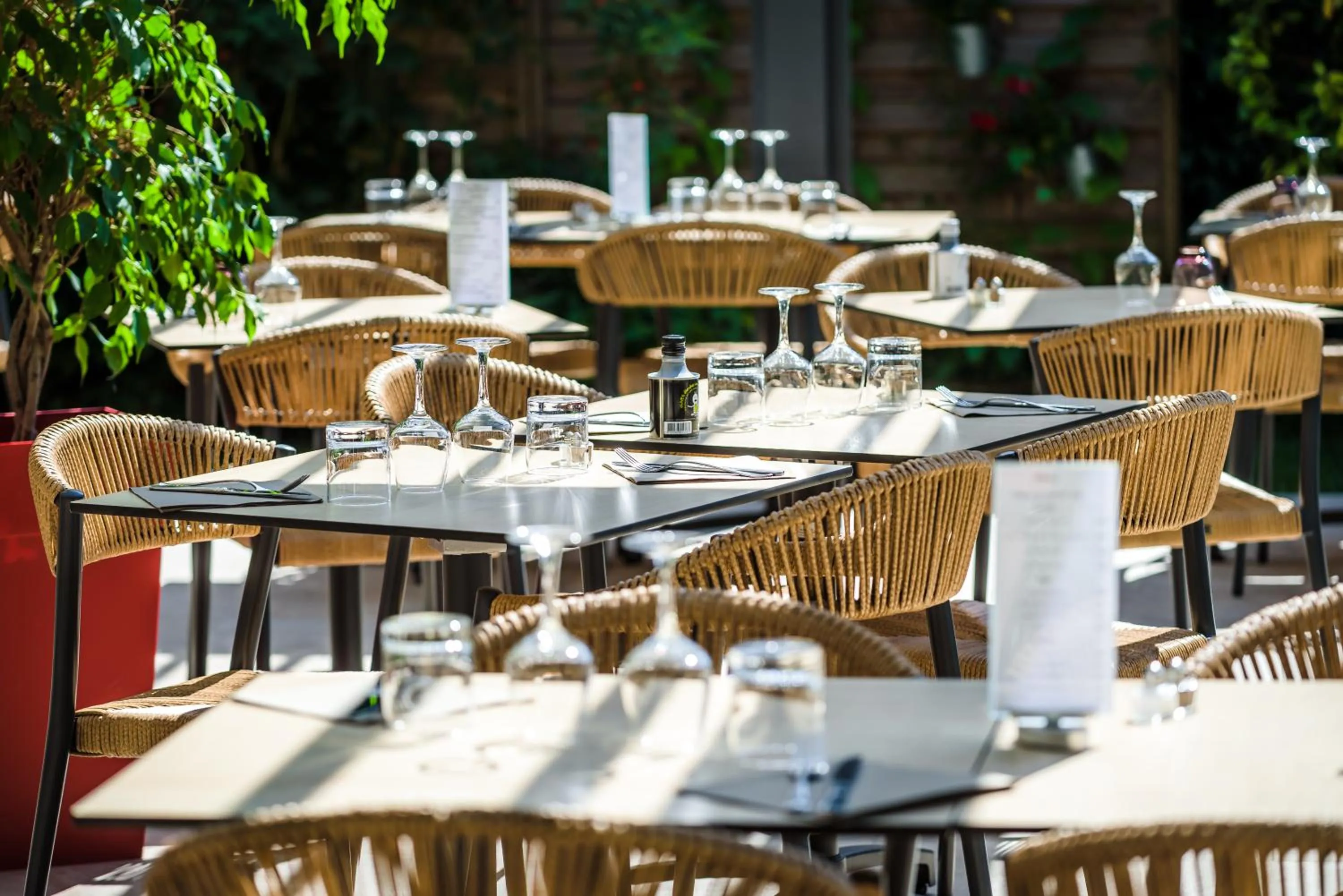 Patio in LOGIS Hôtel Restaurant Le Clos Fleuri