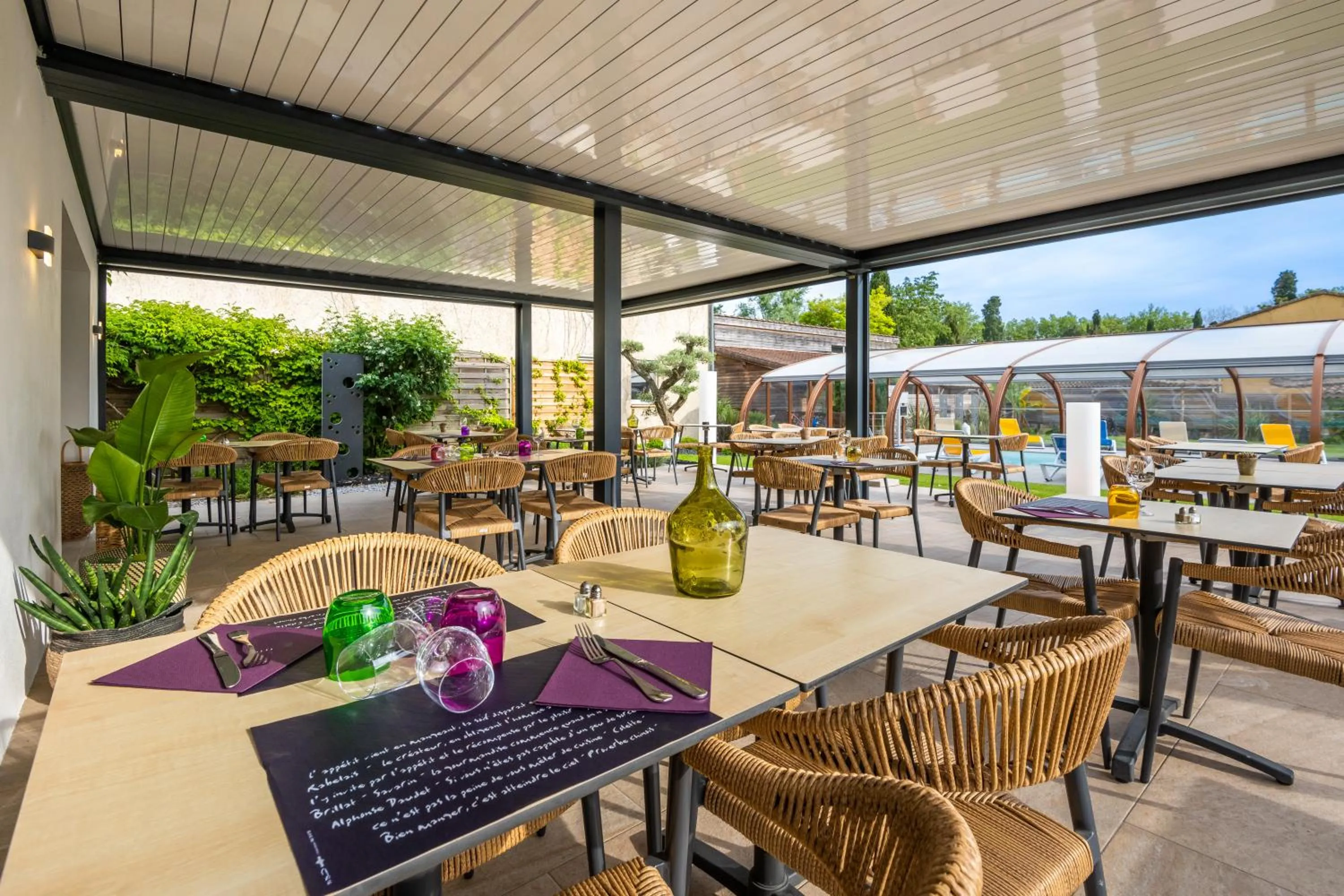 Patio in LOGIS Hôtel Restaurant Le Clos Fleuri