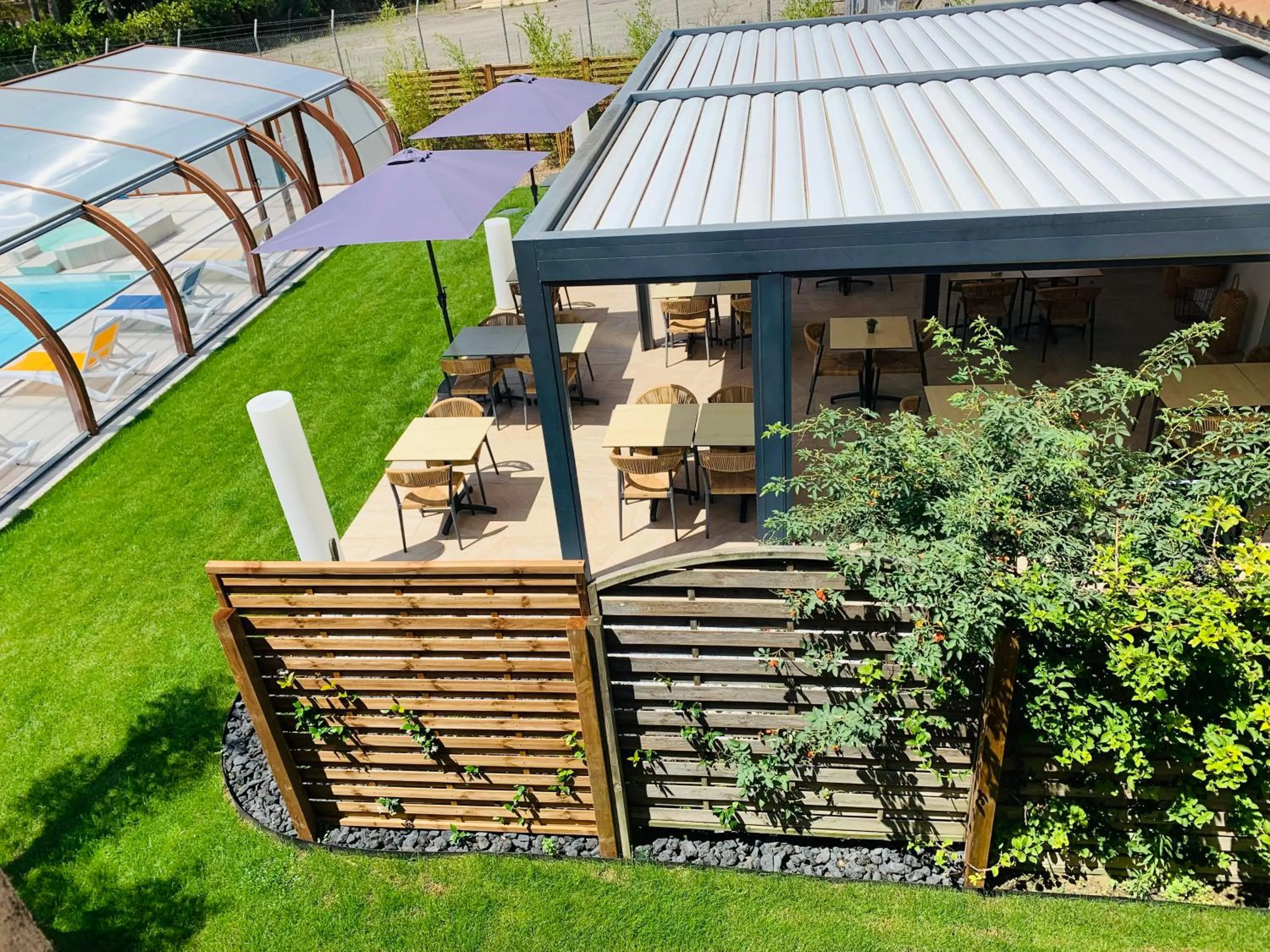 Patio in LOGIS Hôtel Restaurant Le Clos Fleuri