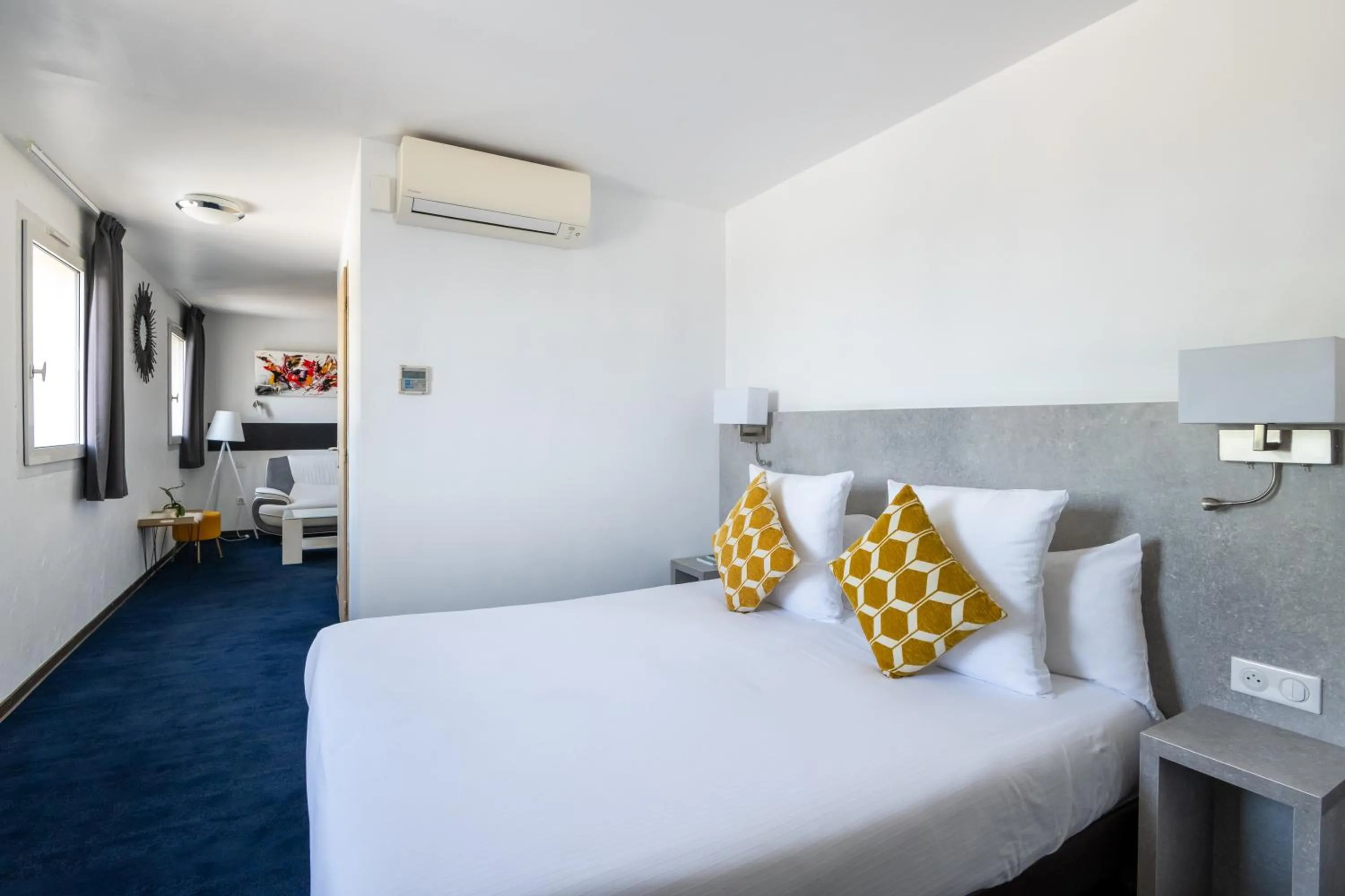 Photo of the whole room, Bed in LOGIS Hôtel Restaurant Le Clos Fleuri