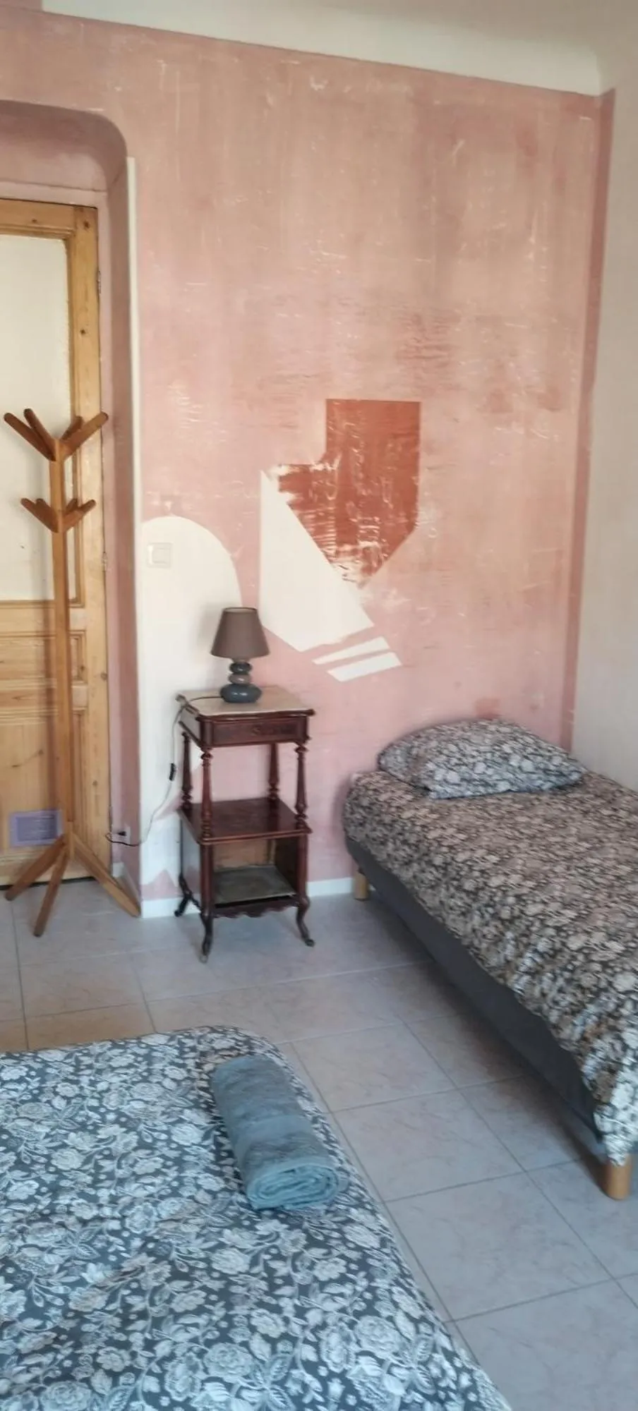 Bed in Chez Brigitte Guesthouse