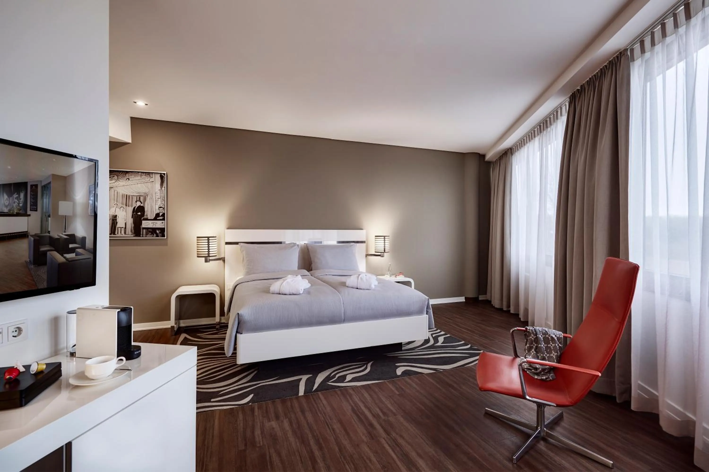 Bed in LEGERE HOTEL Wiesbaden-Taunusstein