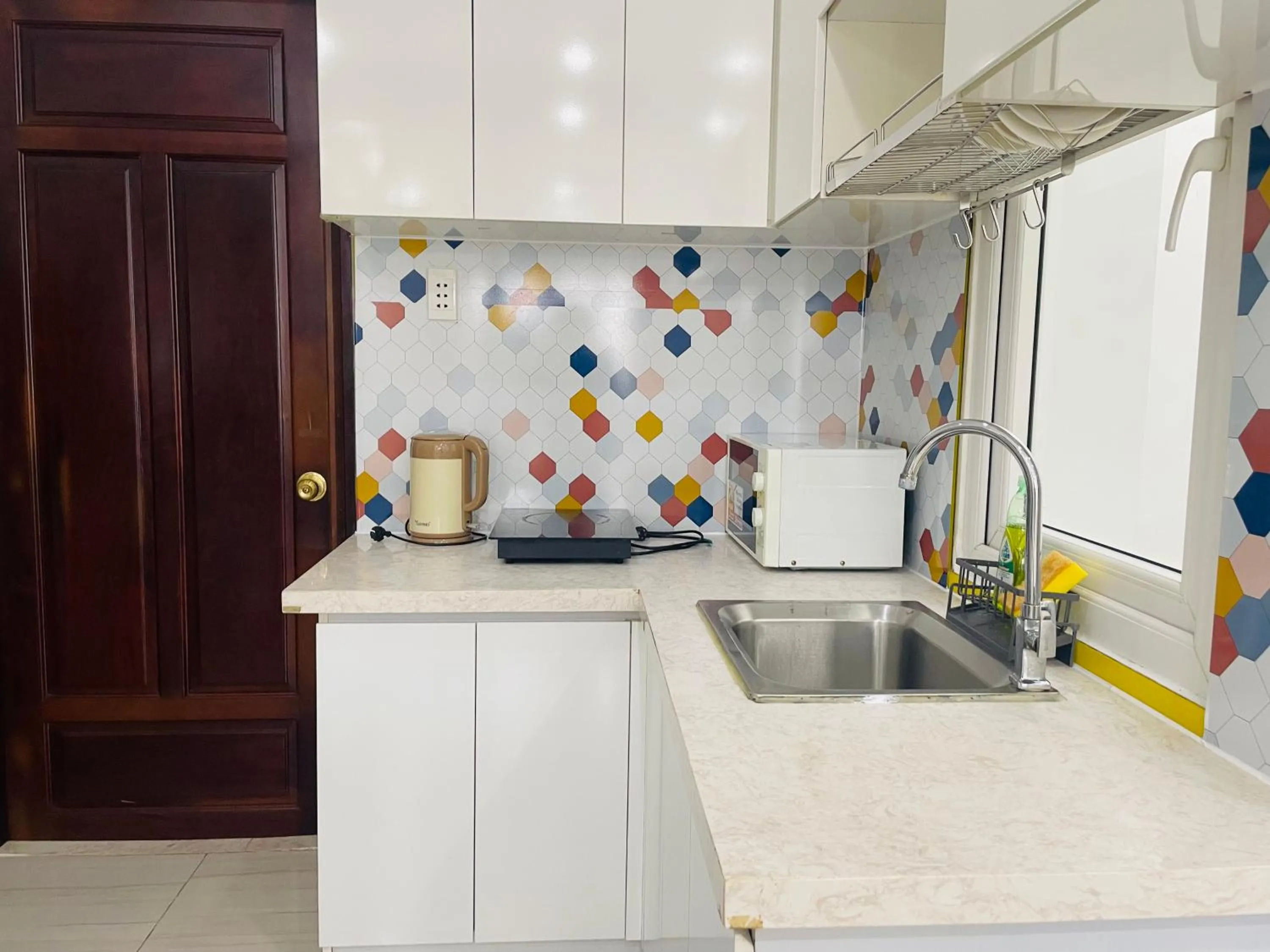 Kitchen or kitchenette in Grace Apartment - HCM