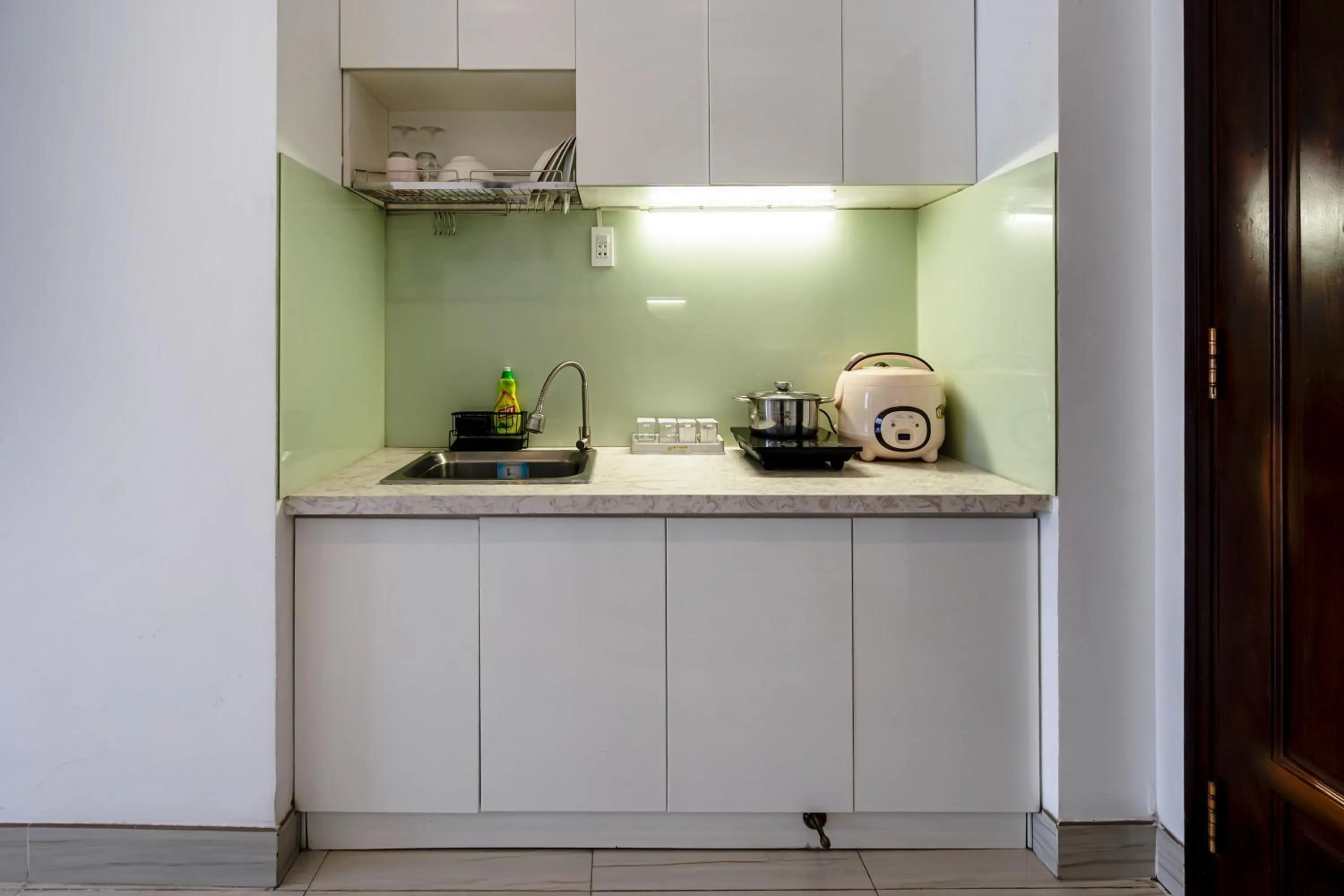 Kitchen or kitchenette in Grace Apartment - HCM