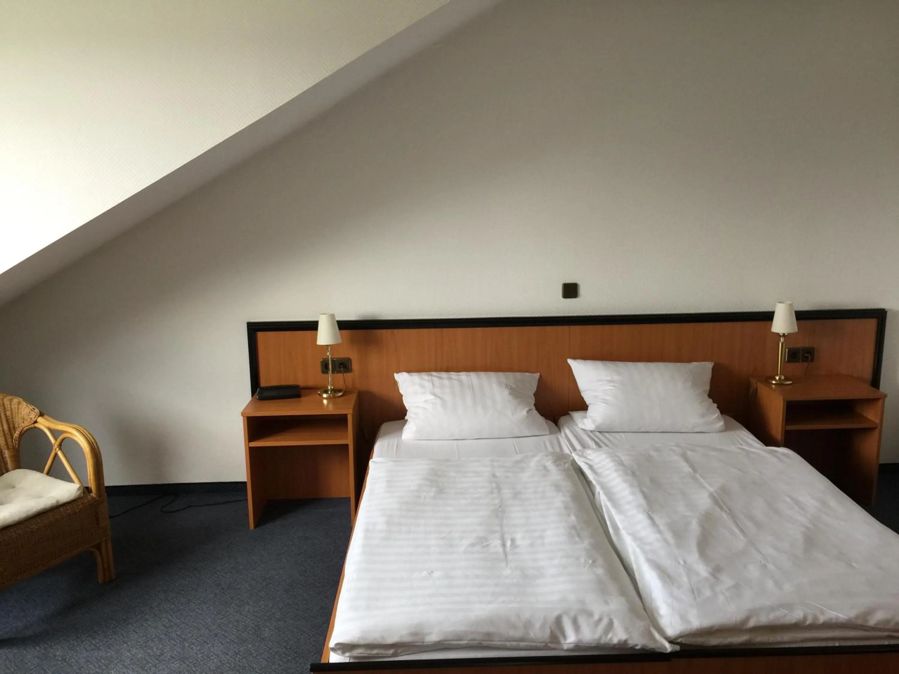 Photo of the whole room, Bed in Altes Gasthaus Stover