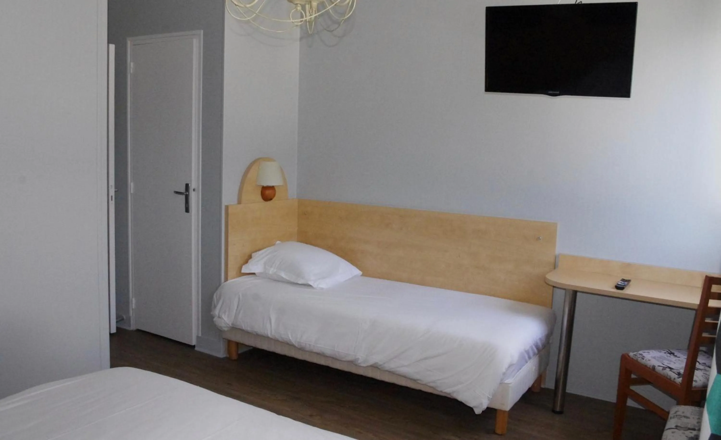 Bed in Hôtel De Paris