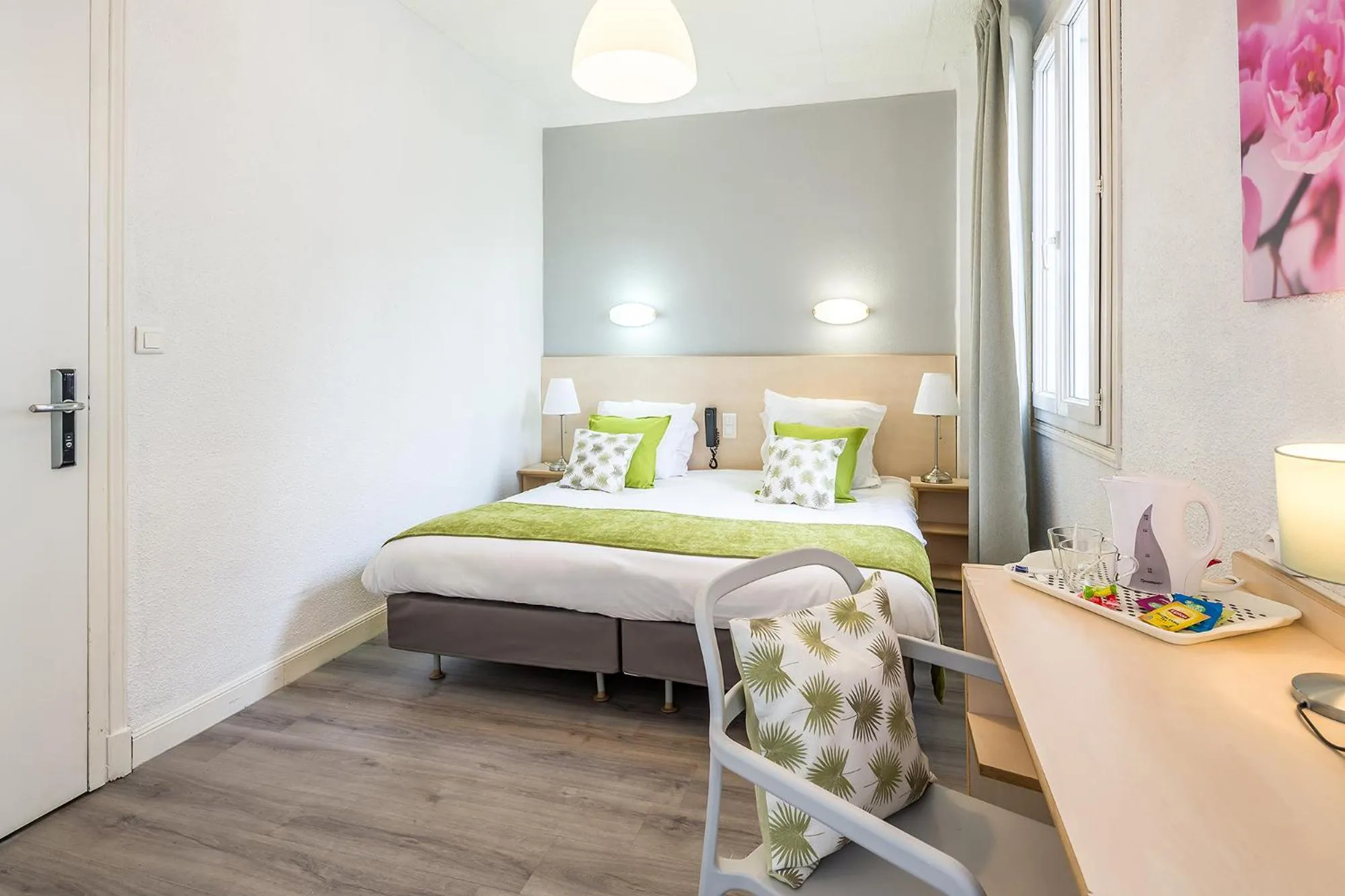 Bed in Hôtel Notre Dame de France