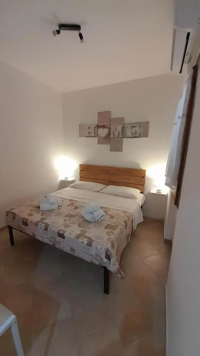 Bed in Borgo Degli Ulivi Rooms