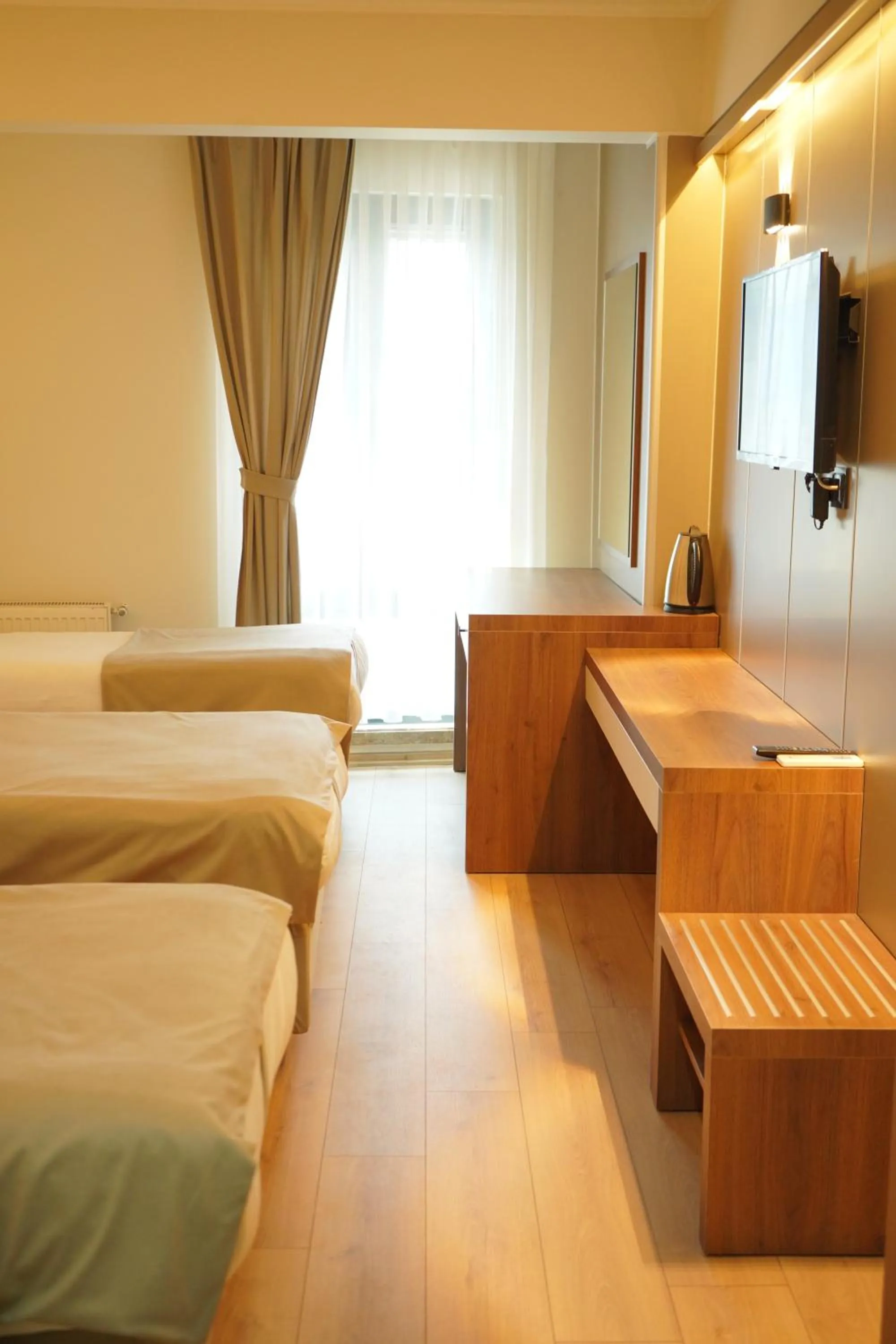 TV and multimedia, Bed in Lioncity Hotel