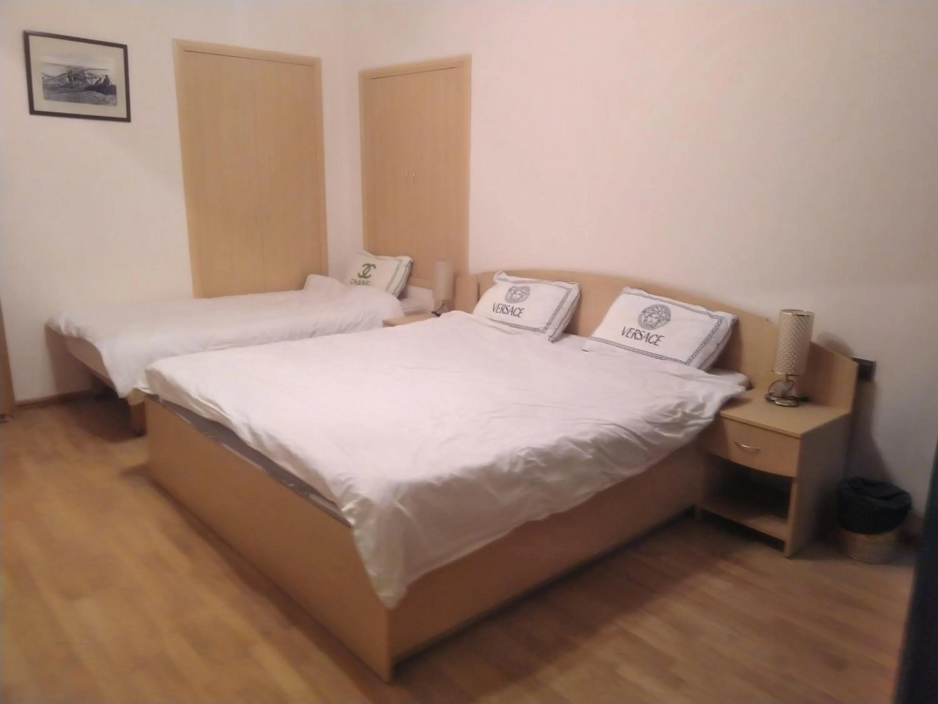 Bed in Old City Inn Hotel