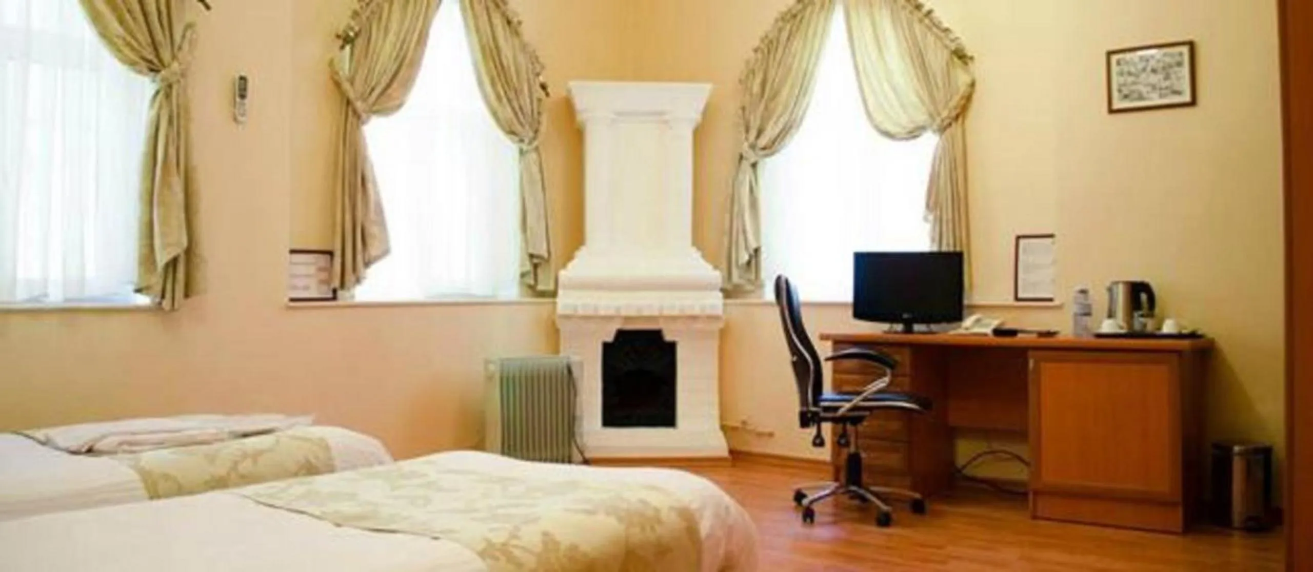 Bed in Old City Inn Hotel