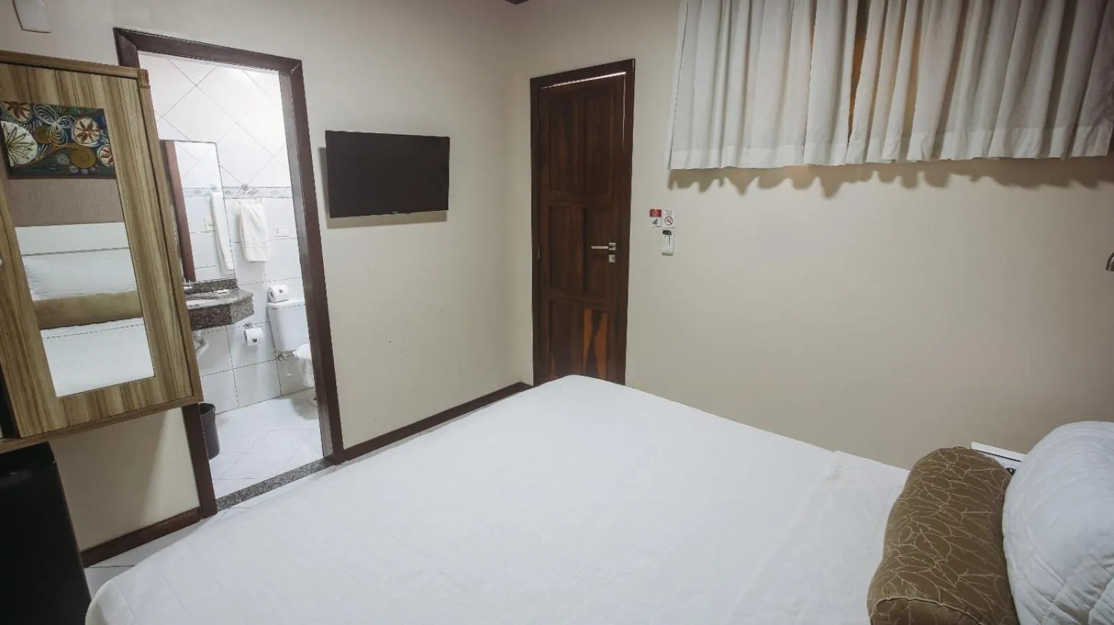 Bed in Pousada Pérola Do Morro