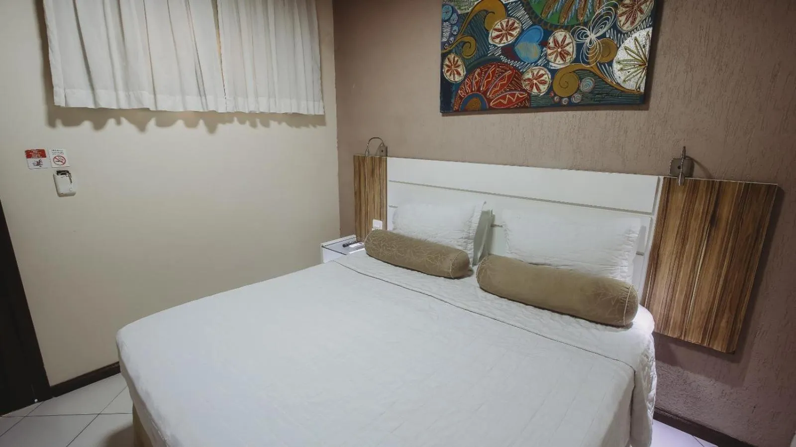 Bed in Pousada Pérola Do Morro