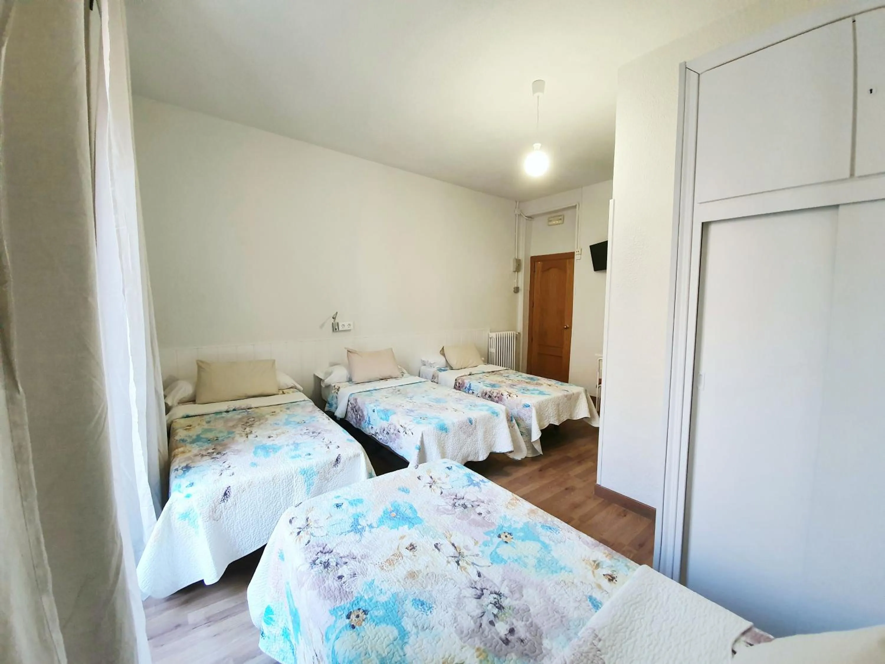 Photo of the whole room, Bed in Hostal Alicante