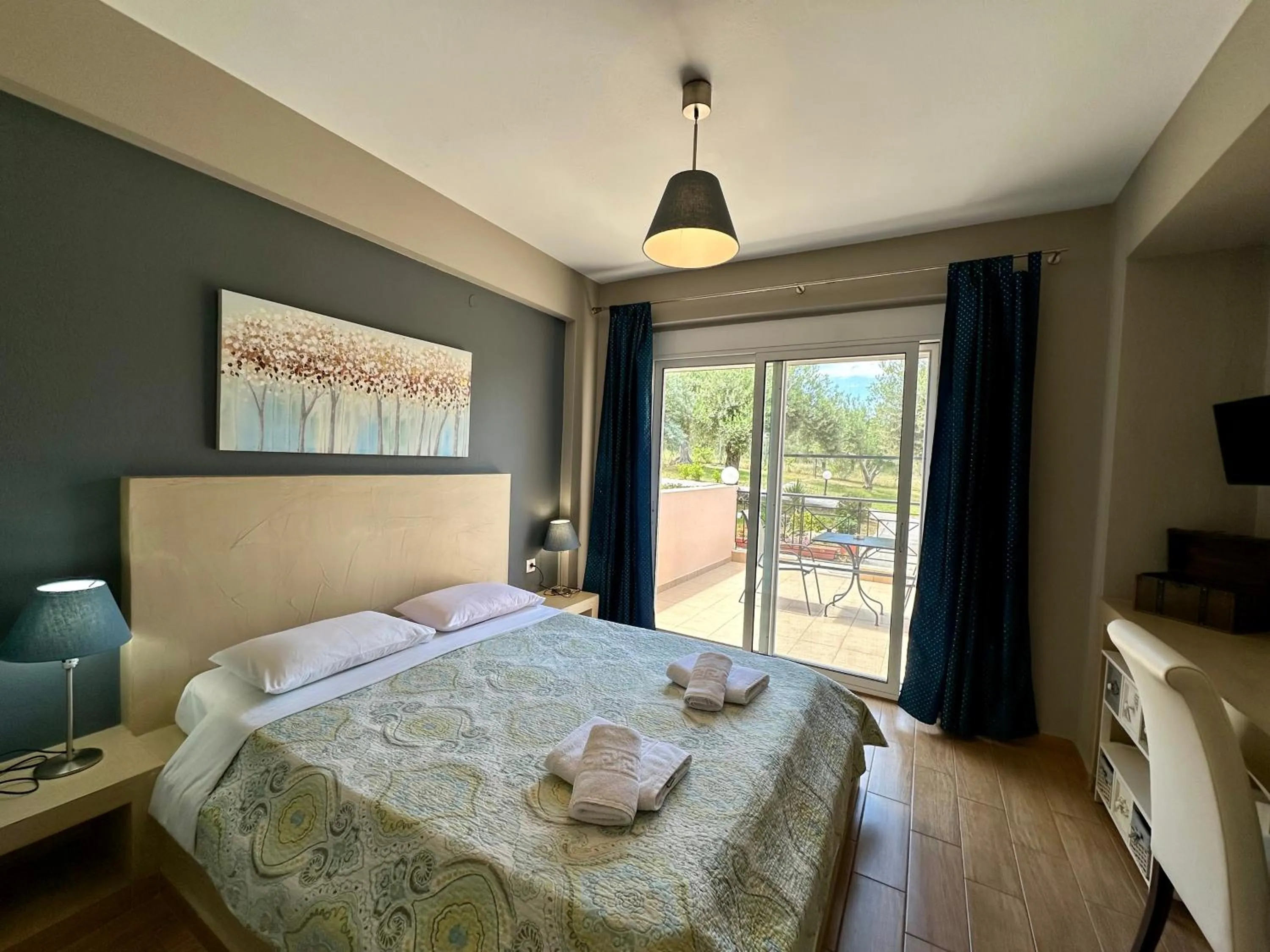 Bed in Agrili Apartments & Rooms