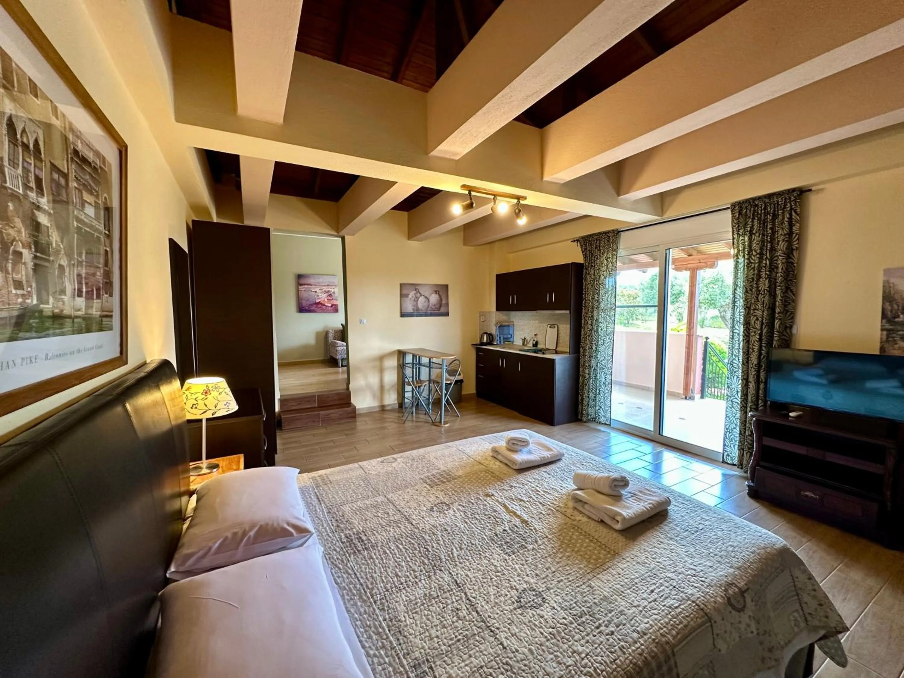 Bed in Agrili Apartments & Rooms