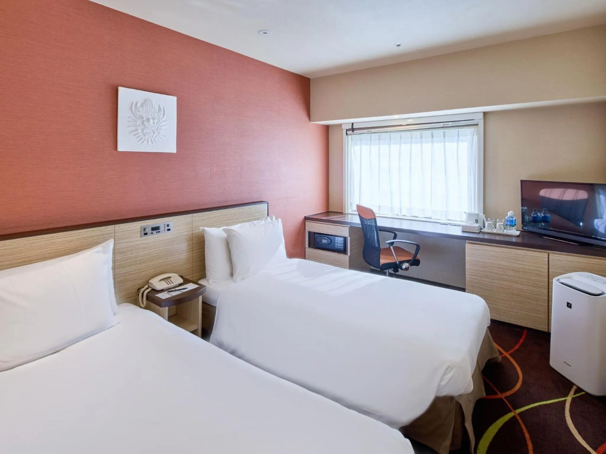 Bed in Okinawa NaHaNa Hotel & Spa