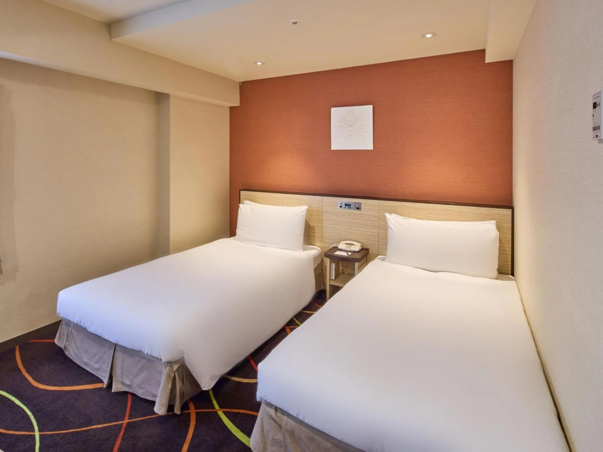 Bed in Okinawa NaHaNa Hotel & Spa