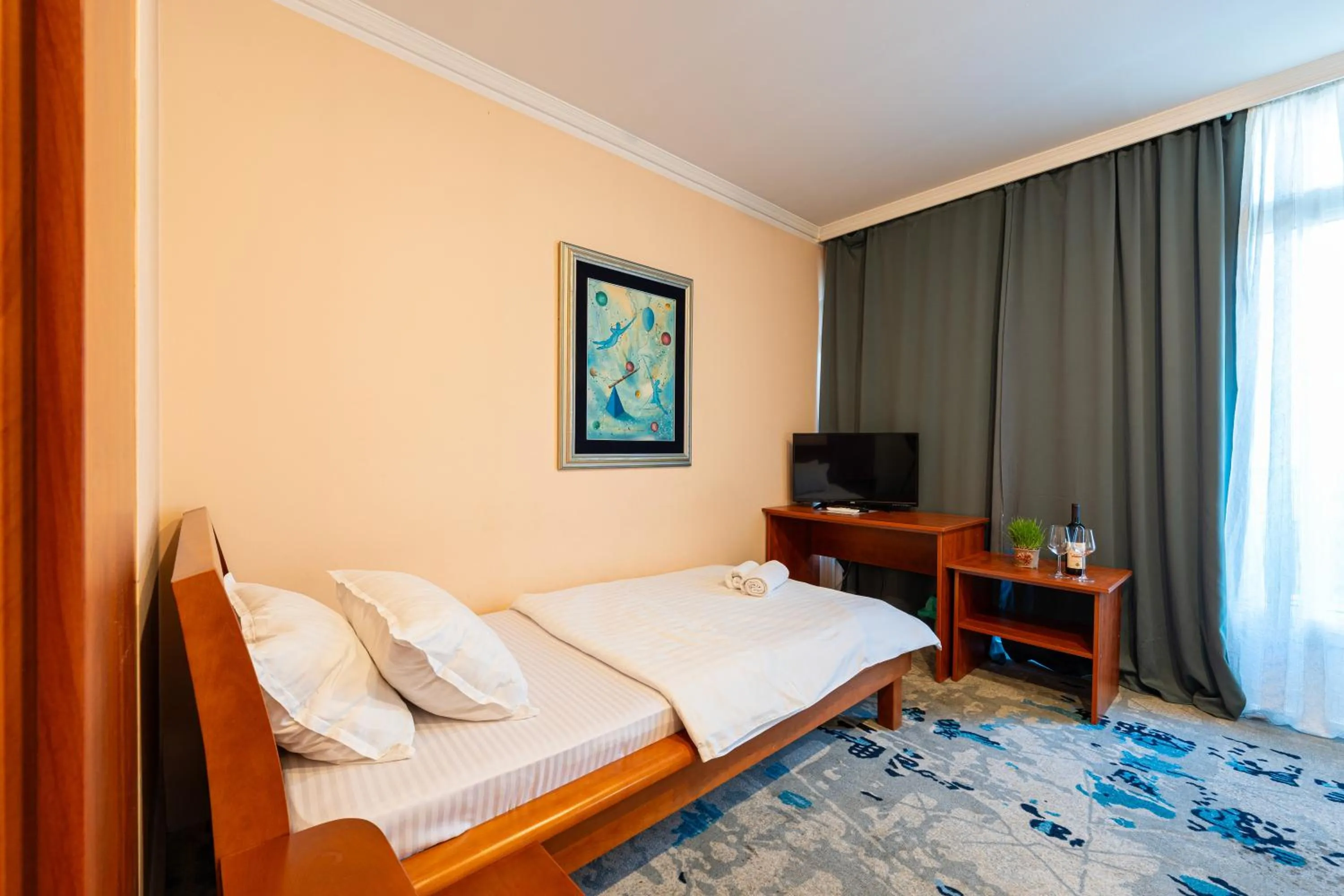 Bed in Hotel Bojatours