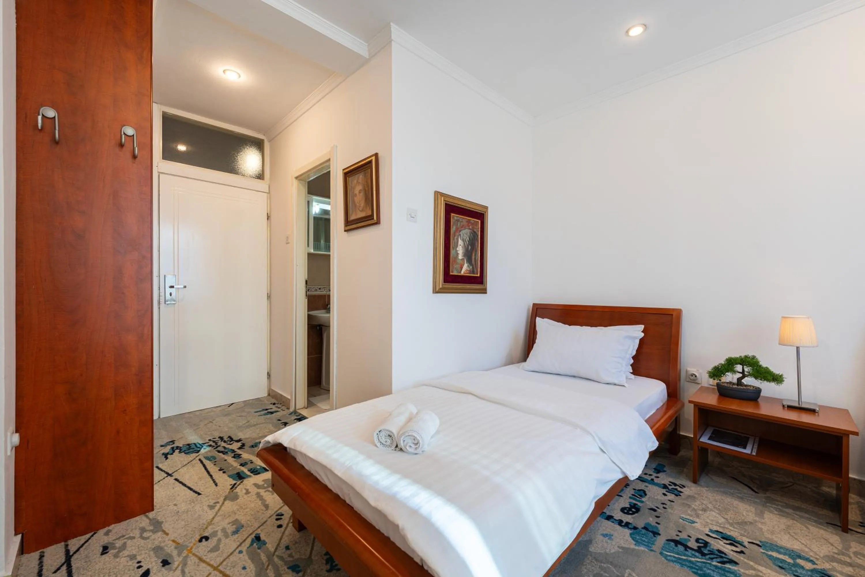 Bed in Hotel Bojatours