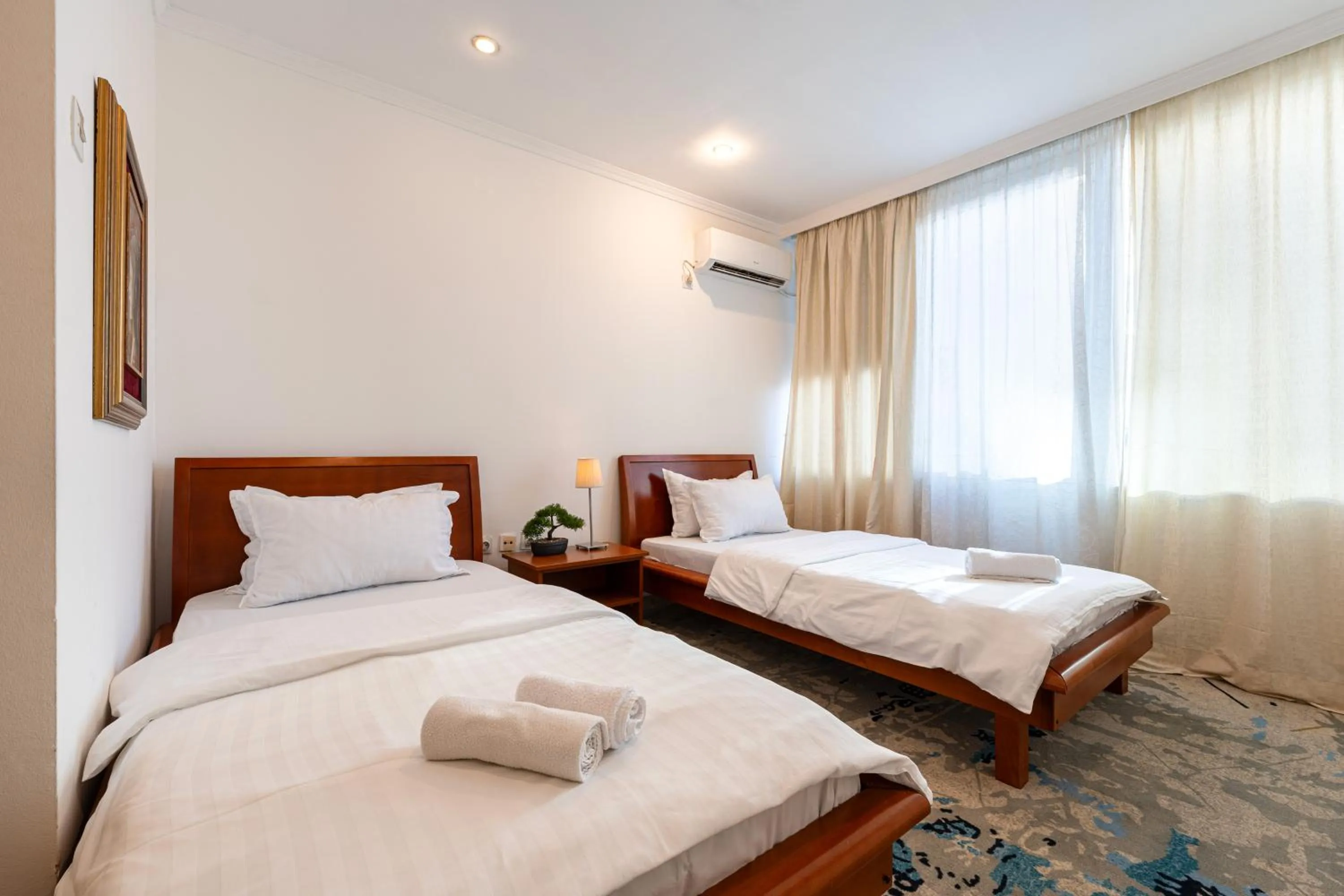 Bed in Hotel Bojatours