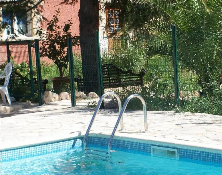 Swimming pool in Apart'Hôtel Les 4 Sources