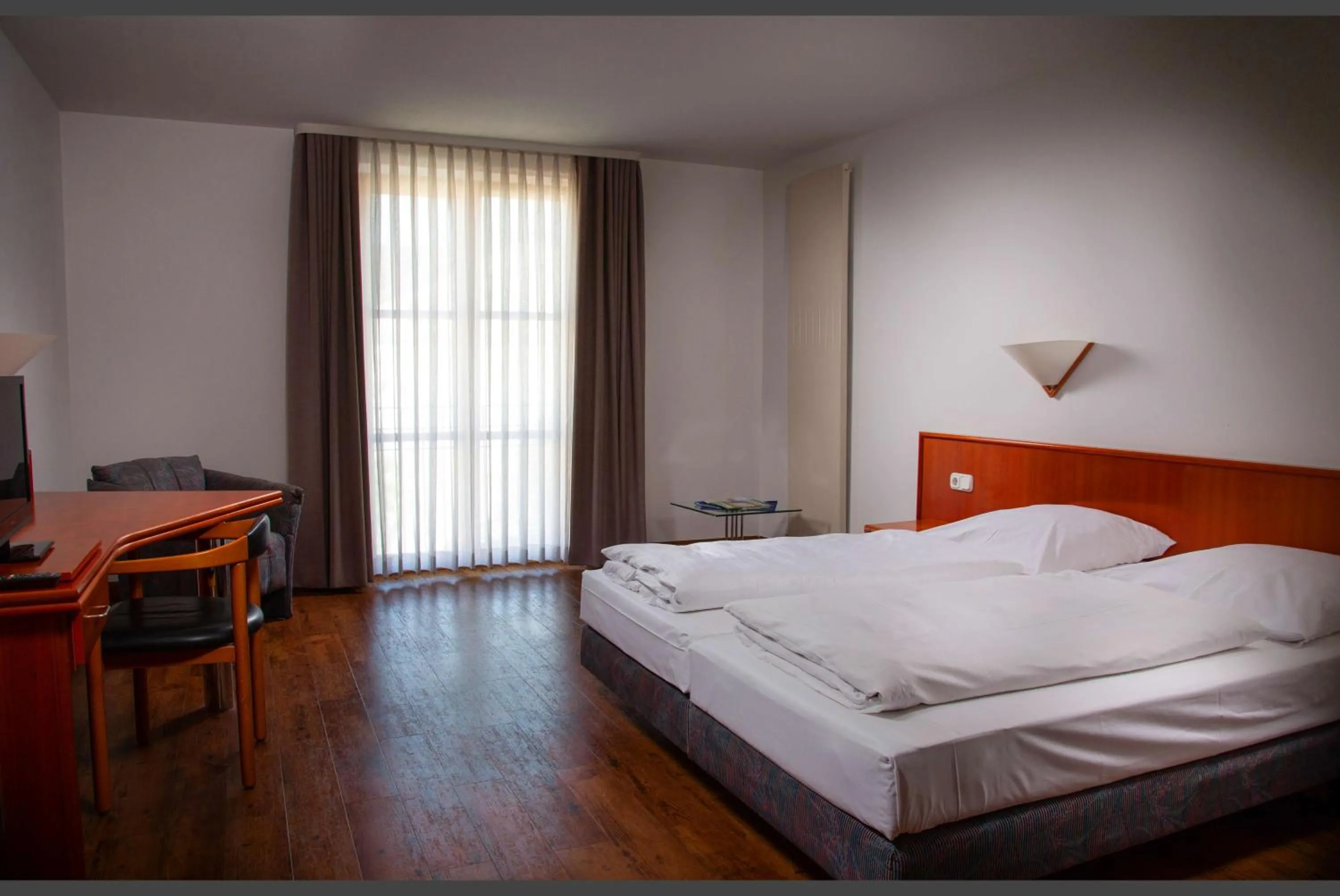 Photo of the whole room, Bed in Altstadthotel Brauereigasthof Winkler