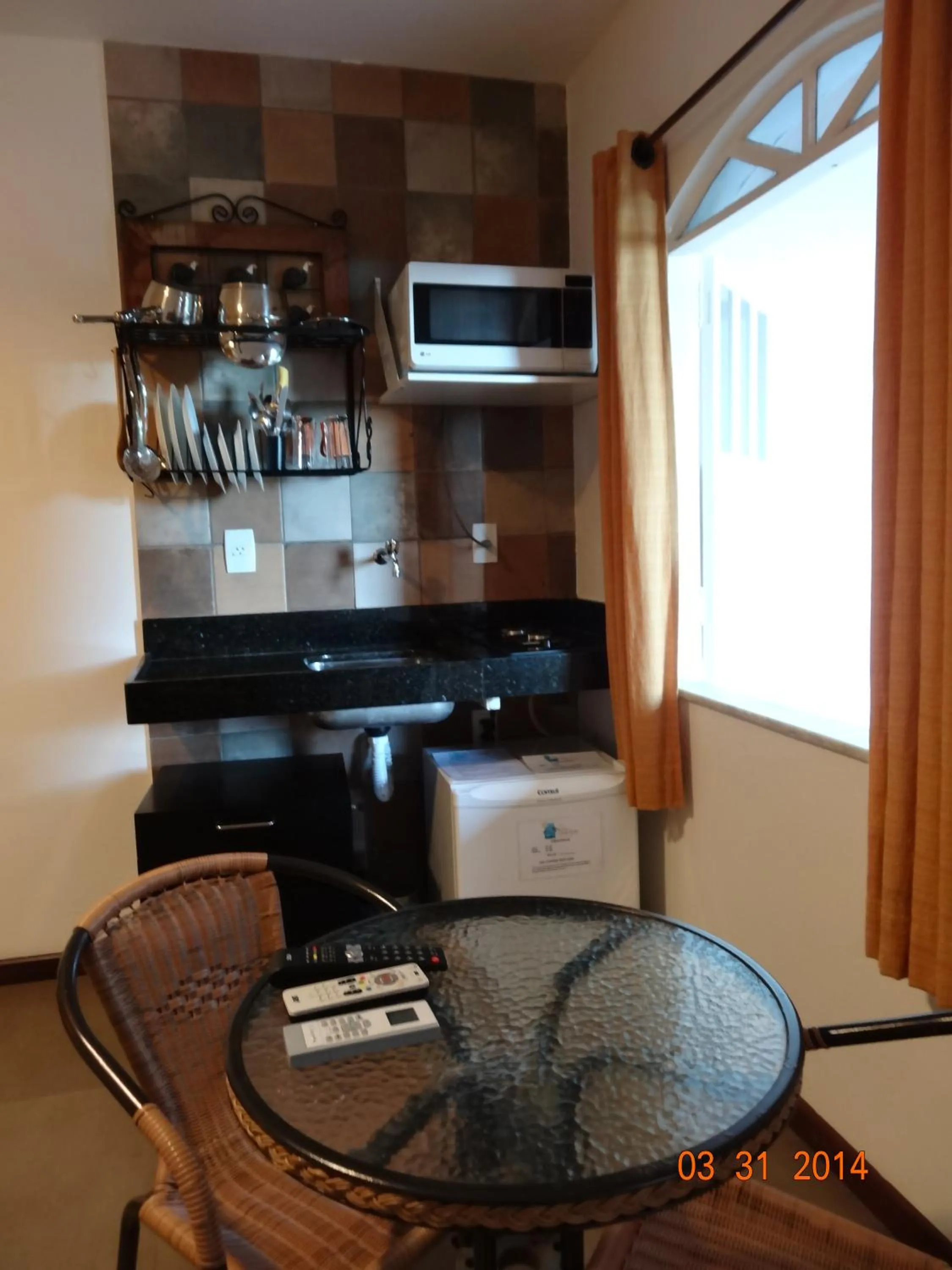 Kitchen or kitchenette in Pousada Ilha da Saudade