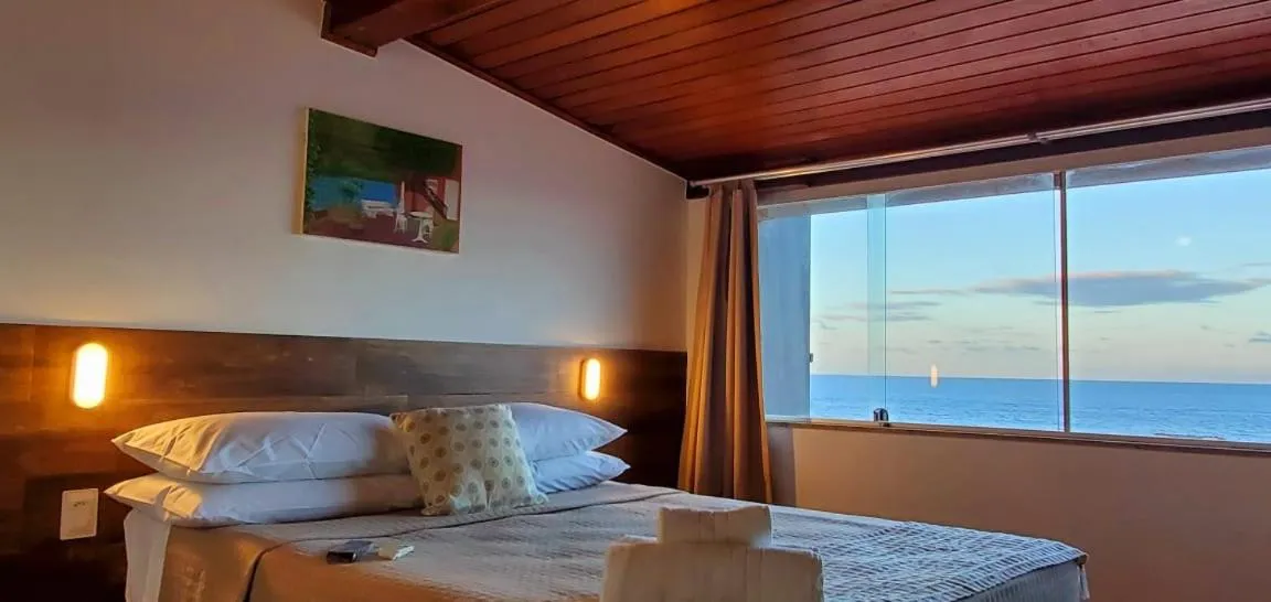 Bed in Pousada Ilha da Saudade