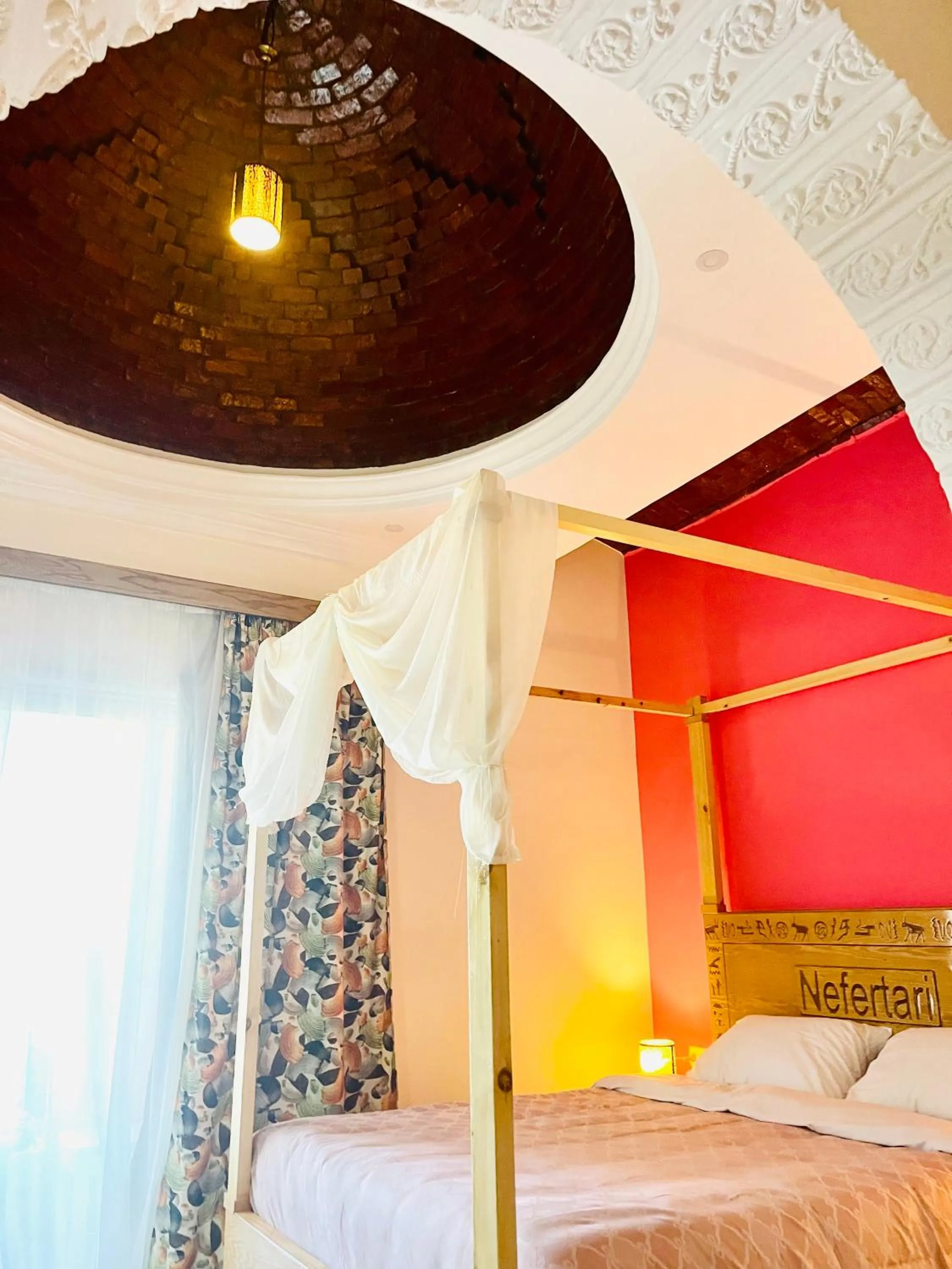 Bed in Jewel Howard Carter Hotel