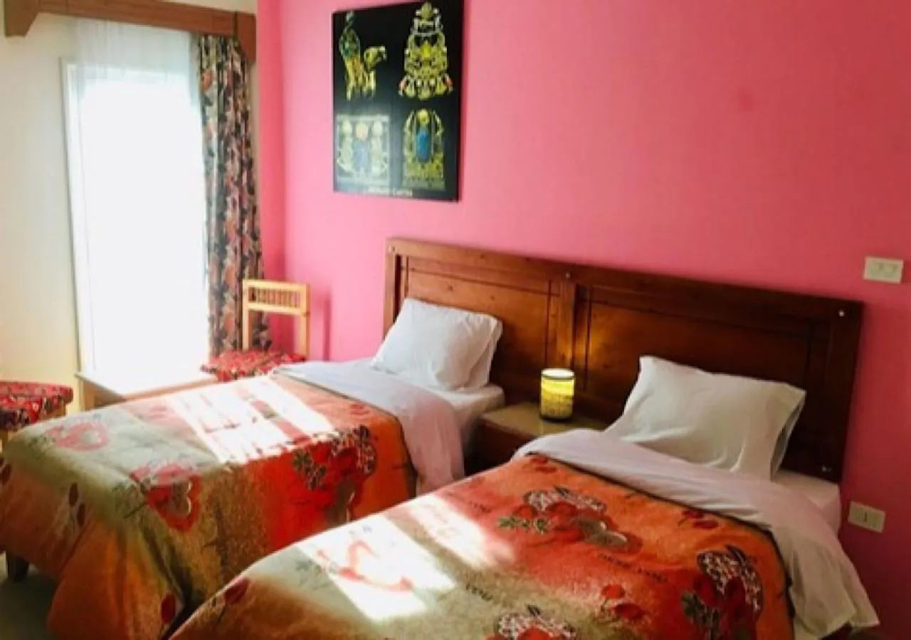 Bed in Jewel Howard Carter Hotel