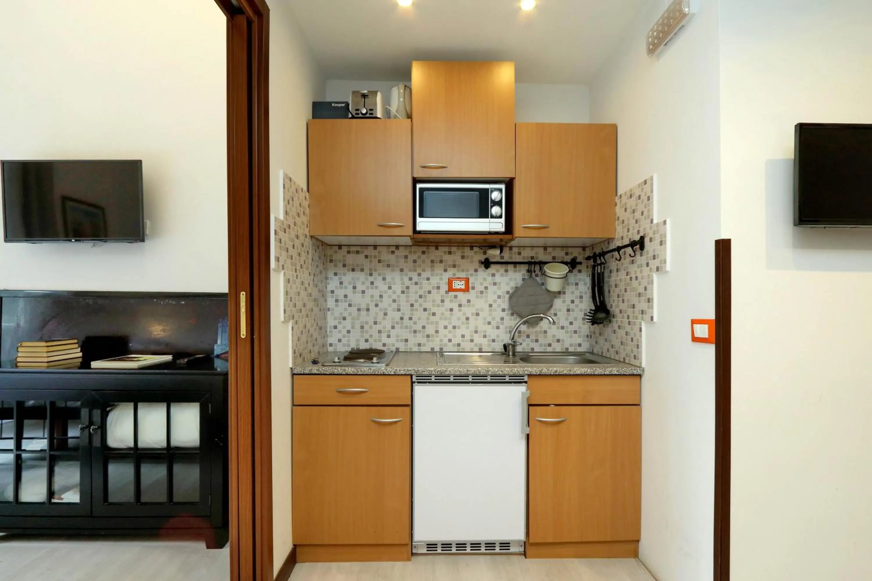 Kitchen or kitchenette in 4BNB - Cavour Square Apartment