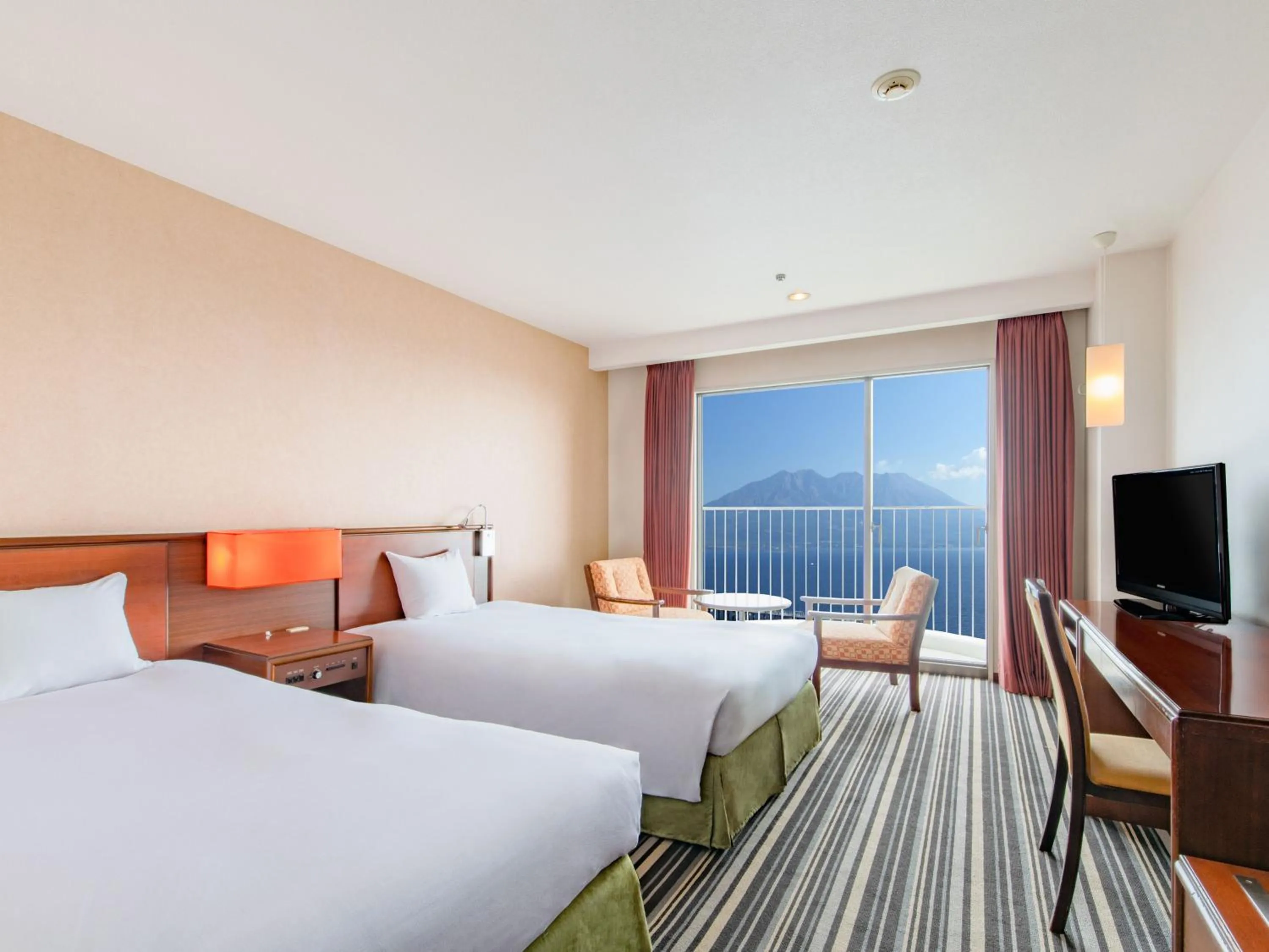 Photo of the whole room, Bed in Art Hotel Kagoshima
