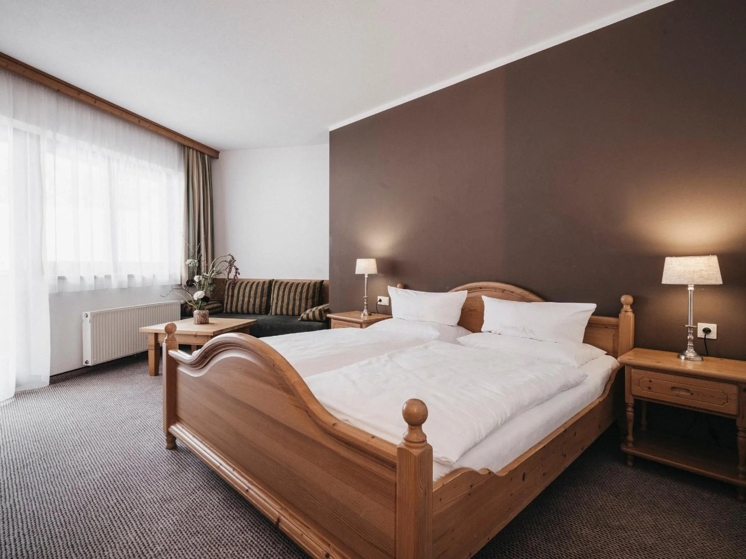 Bed in Almwellness-Resort Tuffbad