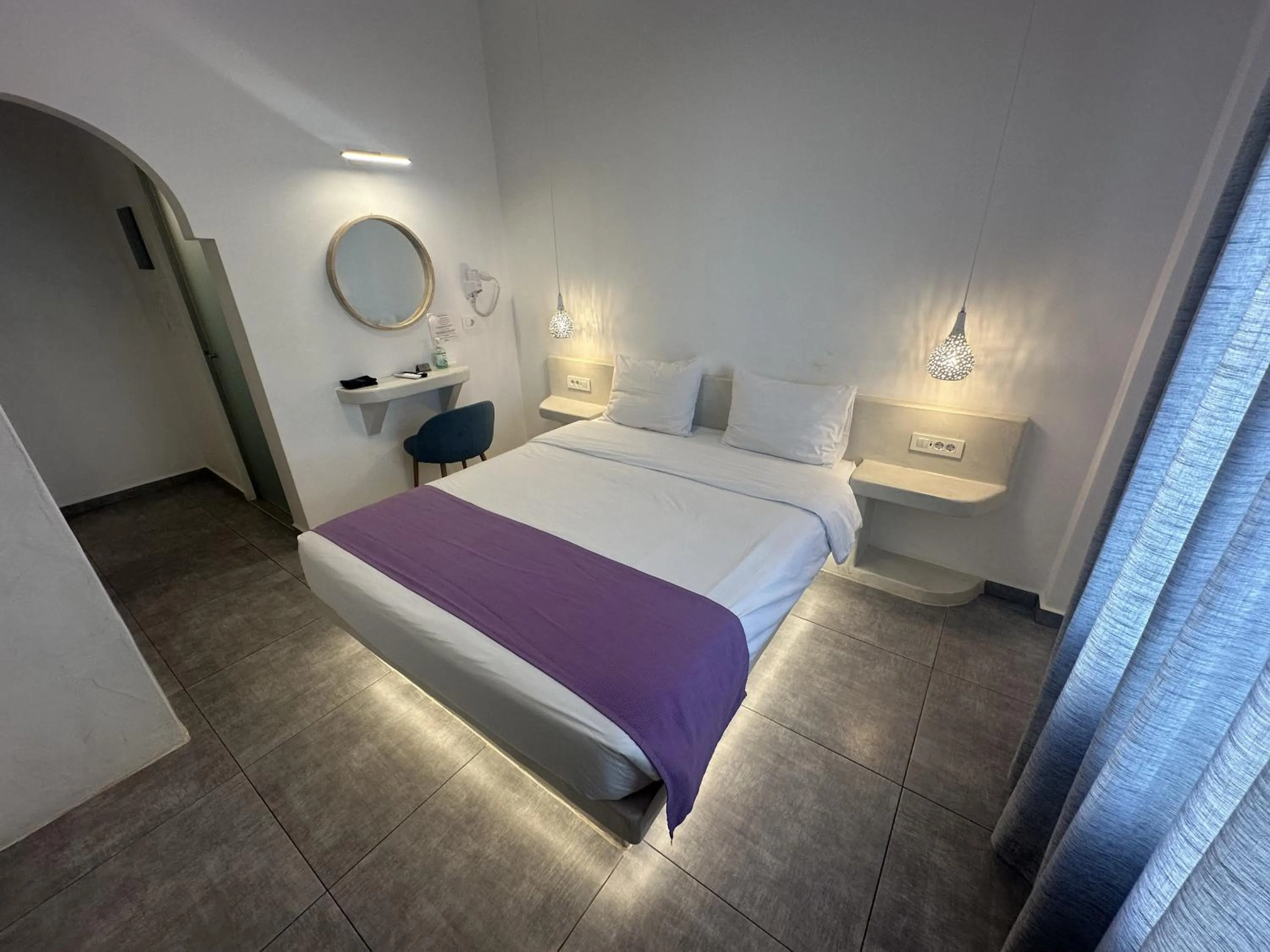 Bed in Markakis Studios Fira Town