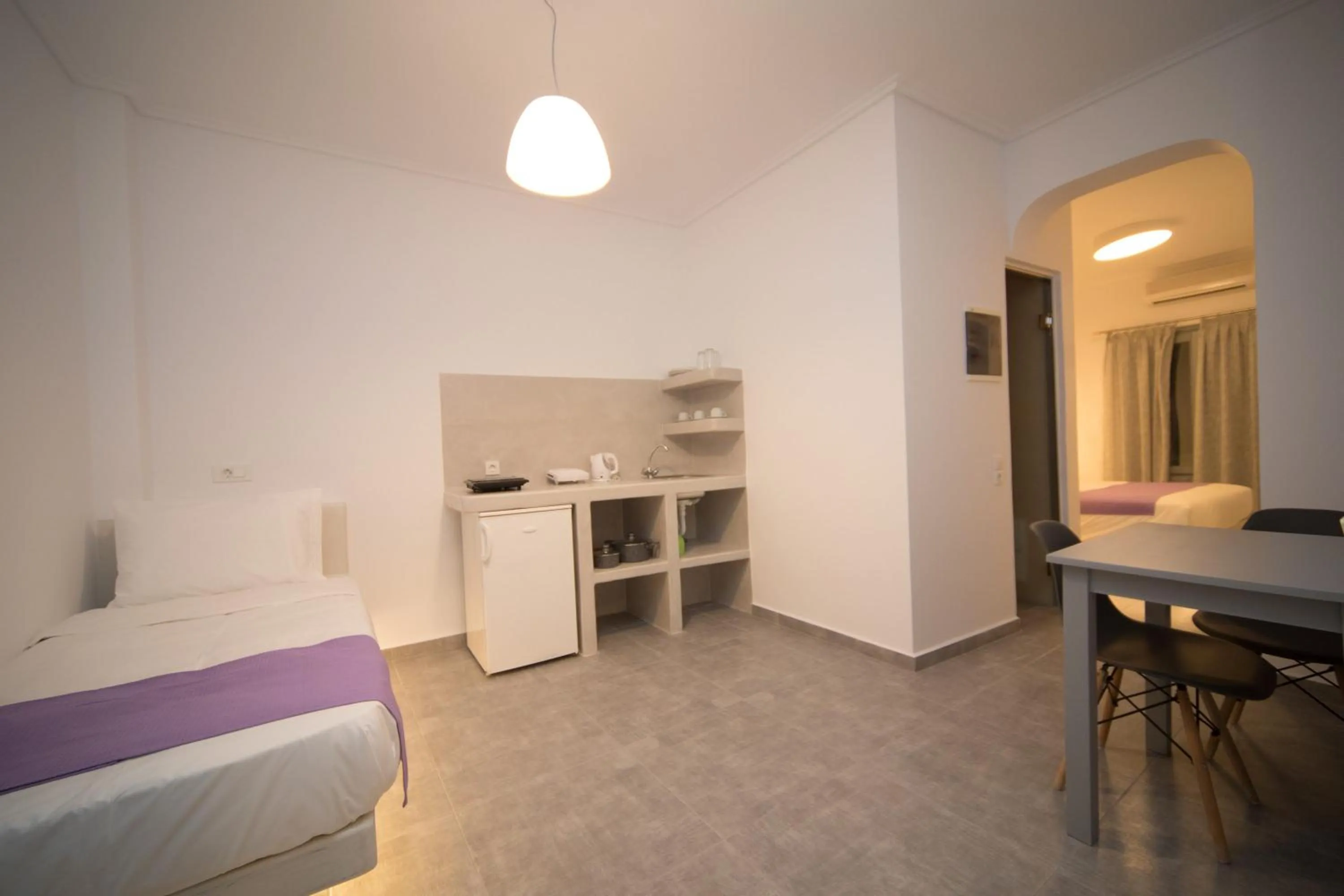 Bed in Markakis Studios Fira Town